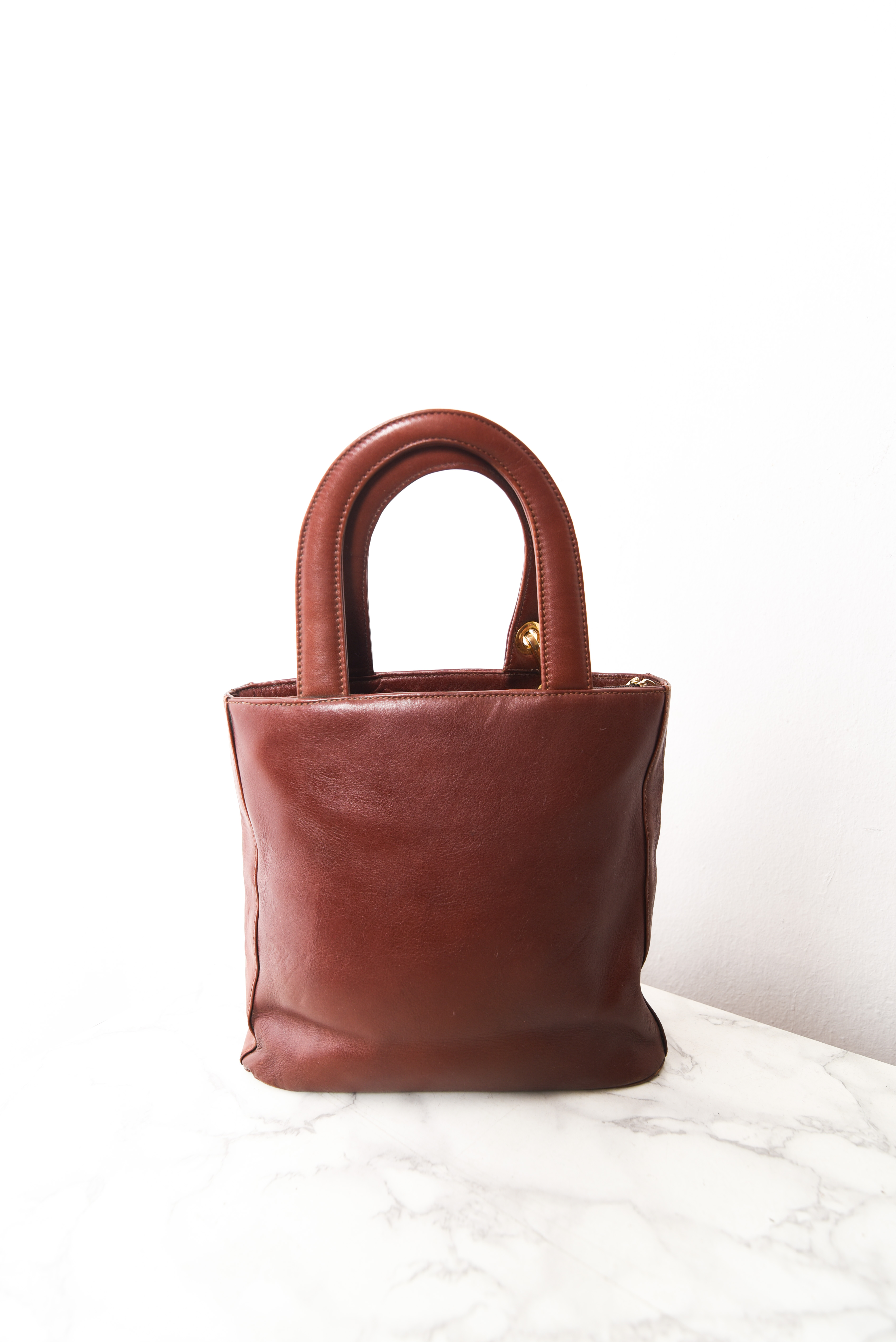 Cartera de mano café cuero vintage
