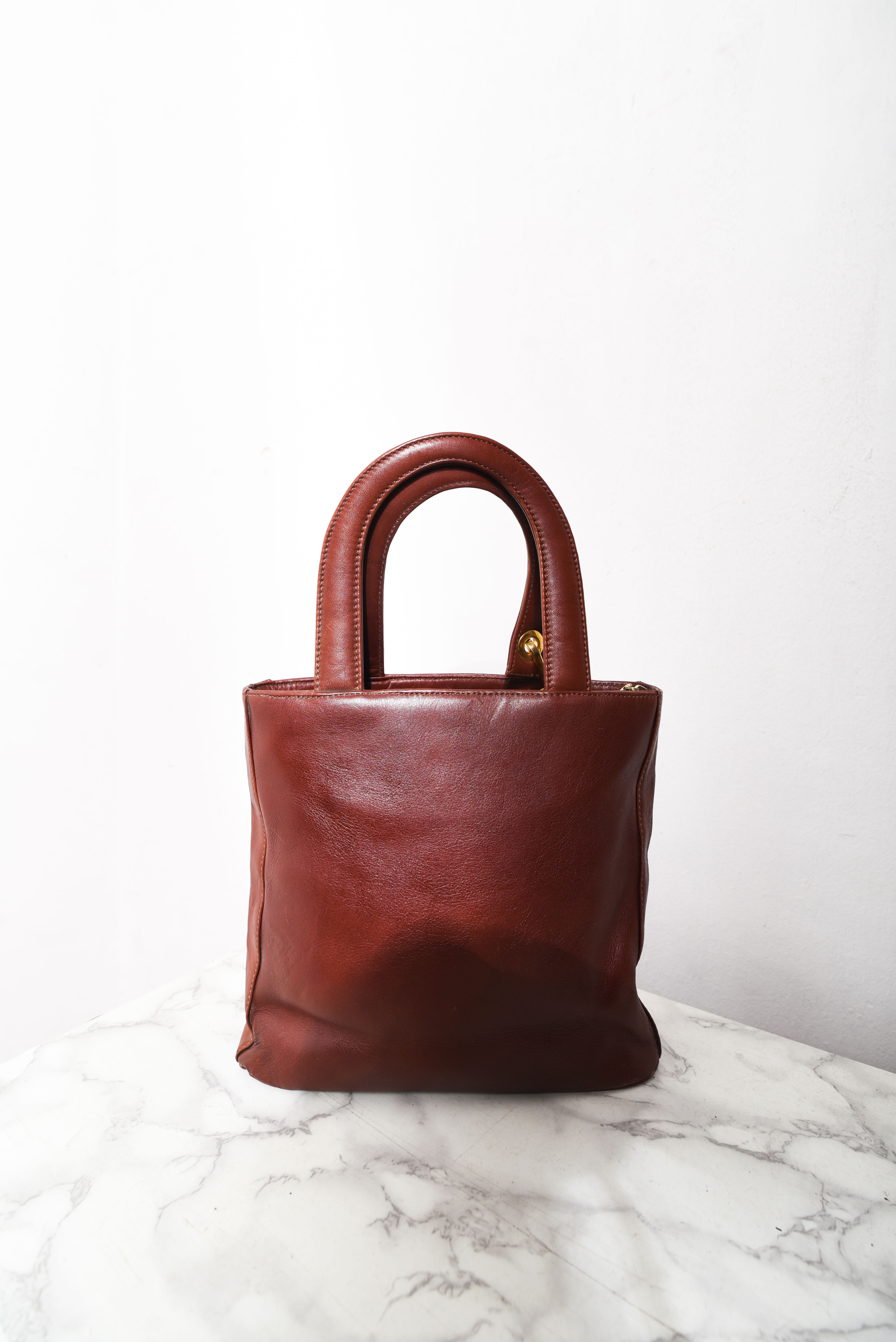 Cartera de mano café cuero vintage