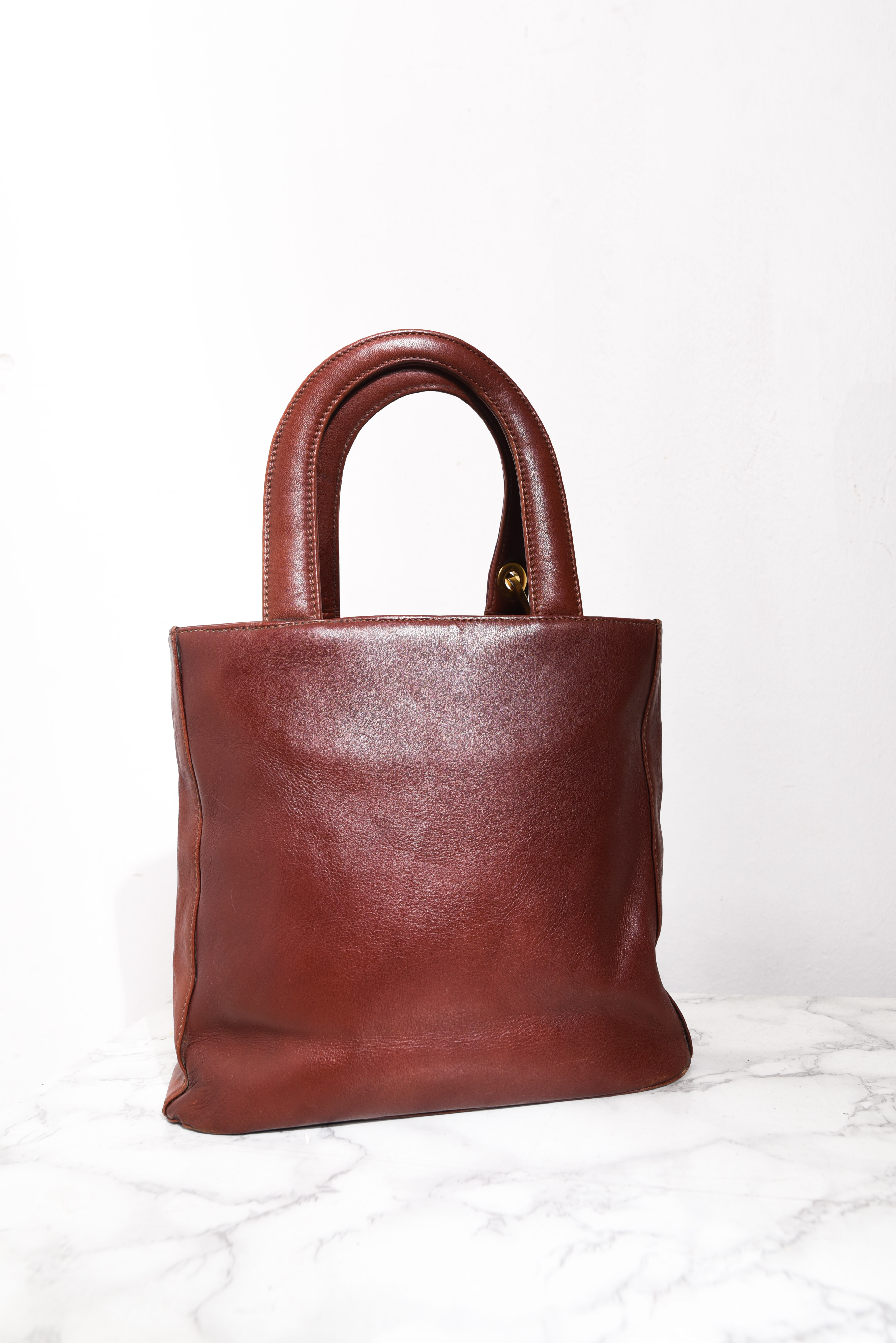 Cartera de mano café cuero vintage