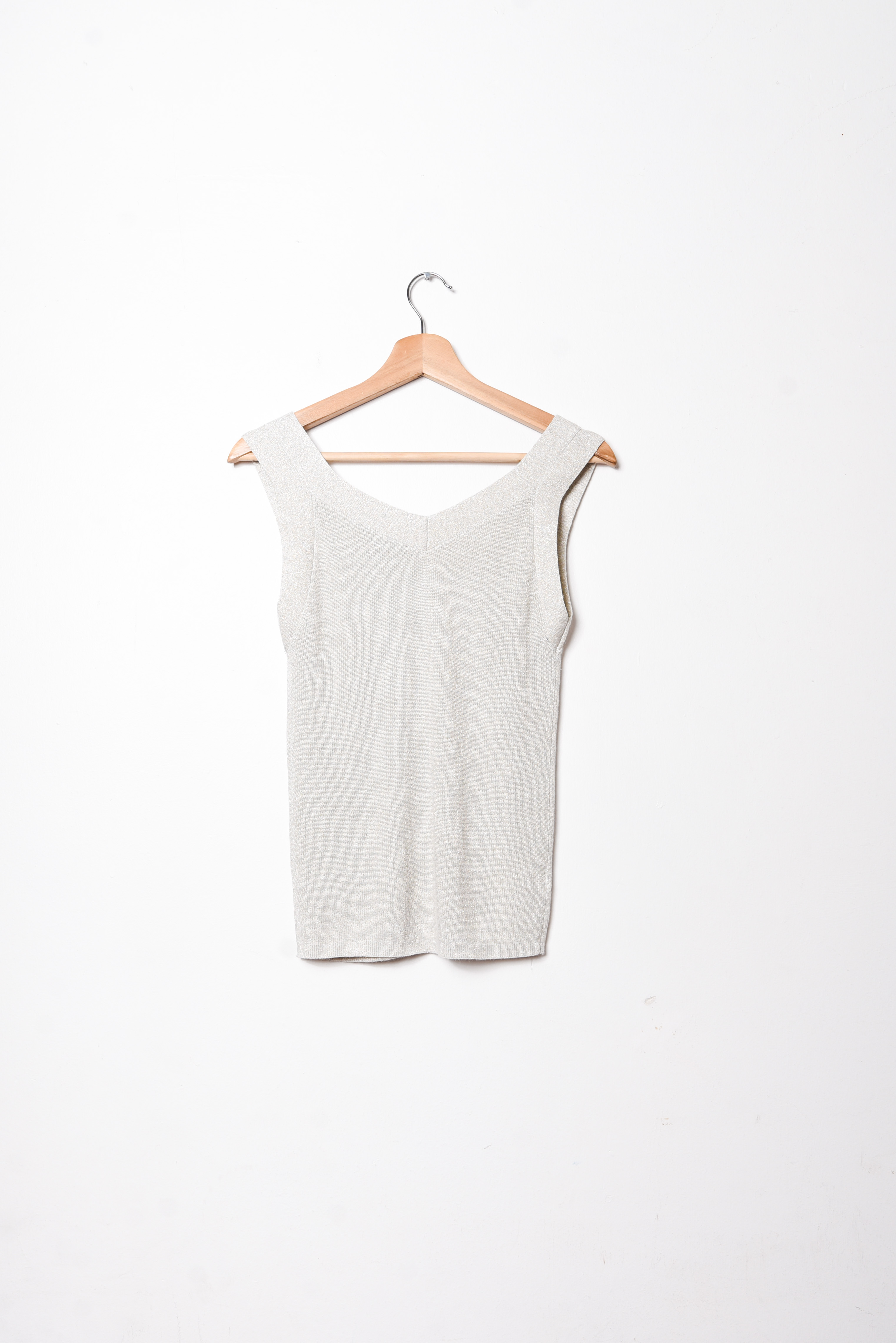 Top tejido beige brillos