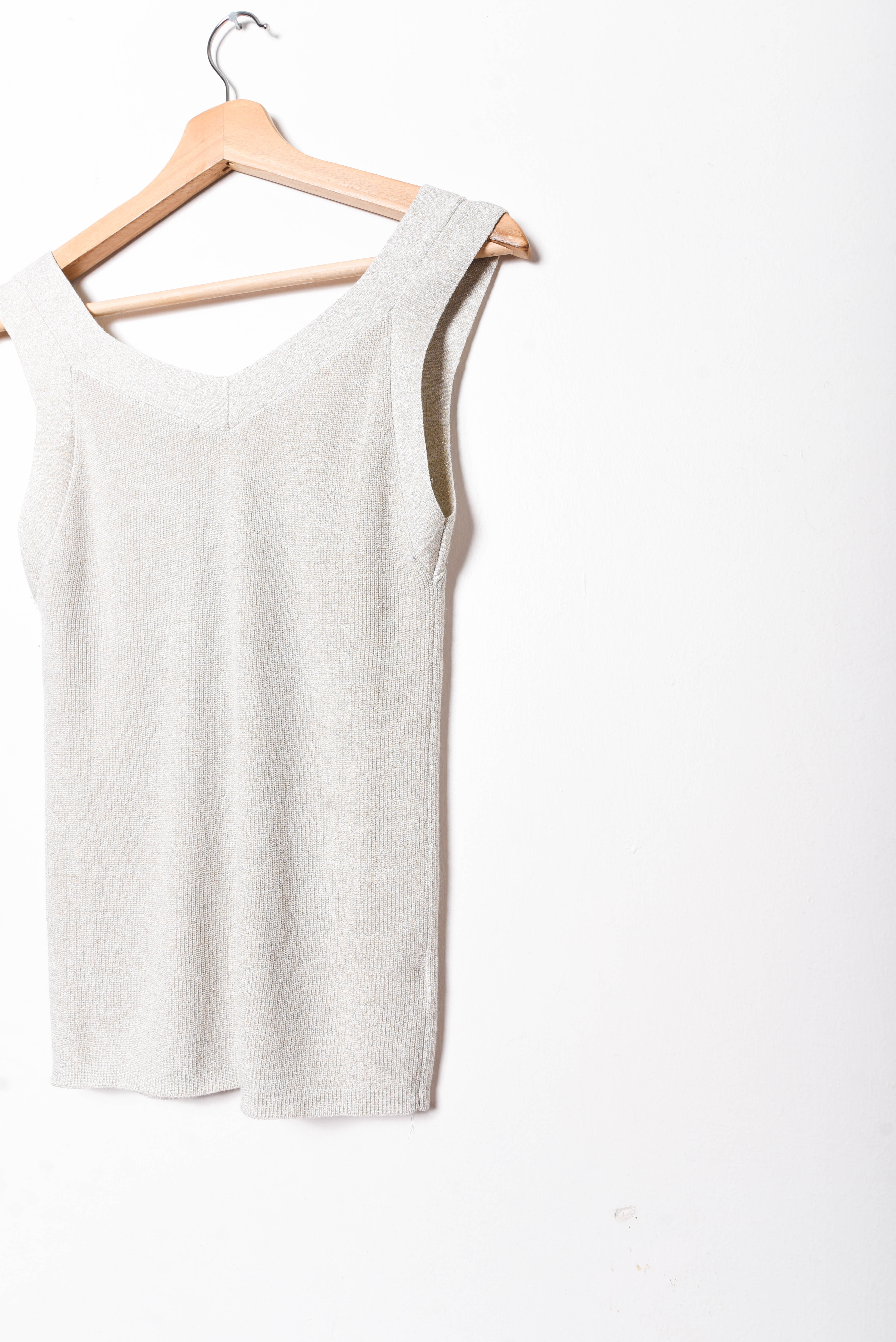Top tejido beige brillos