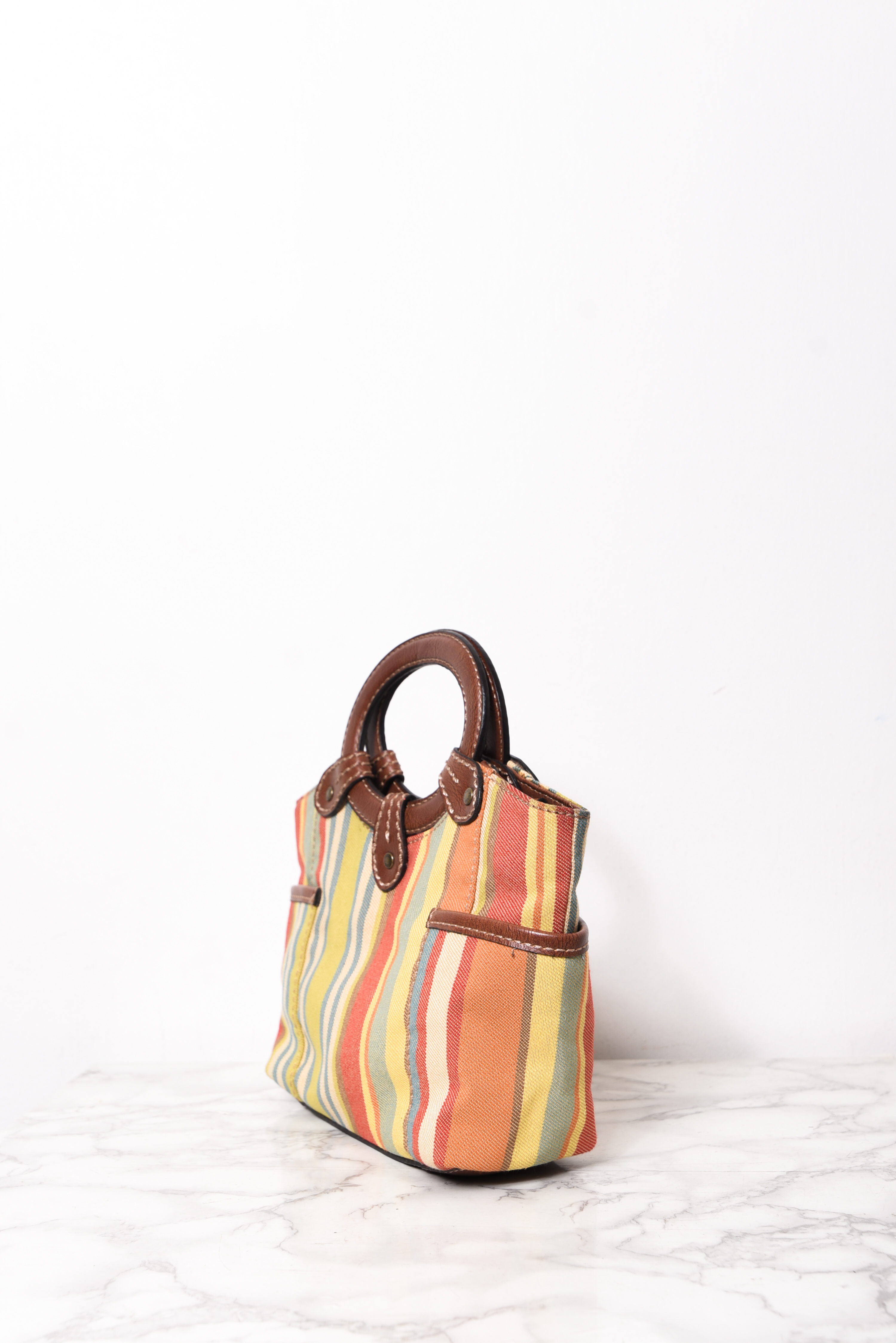 Cartera de mano rayada Fossil