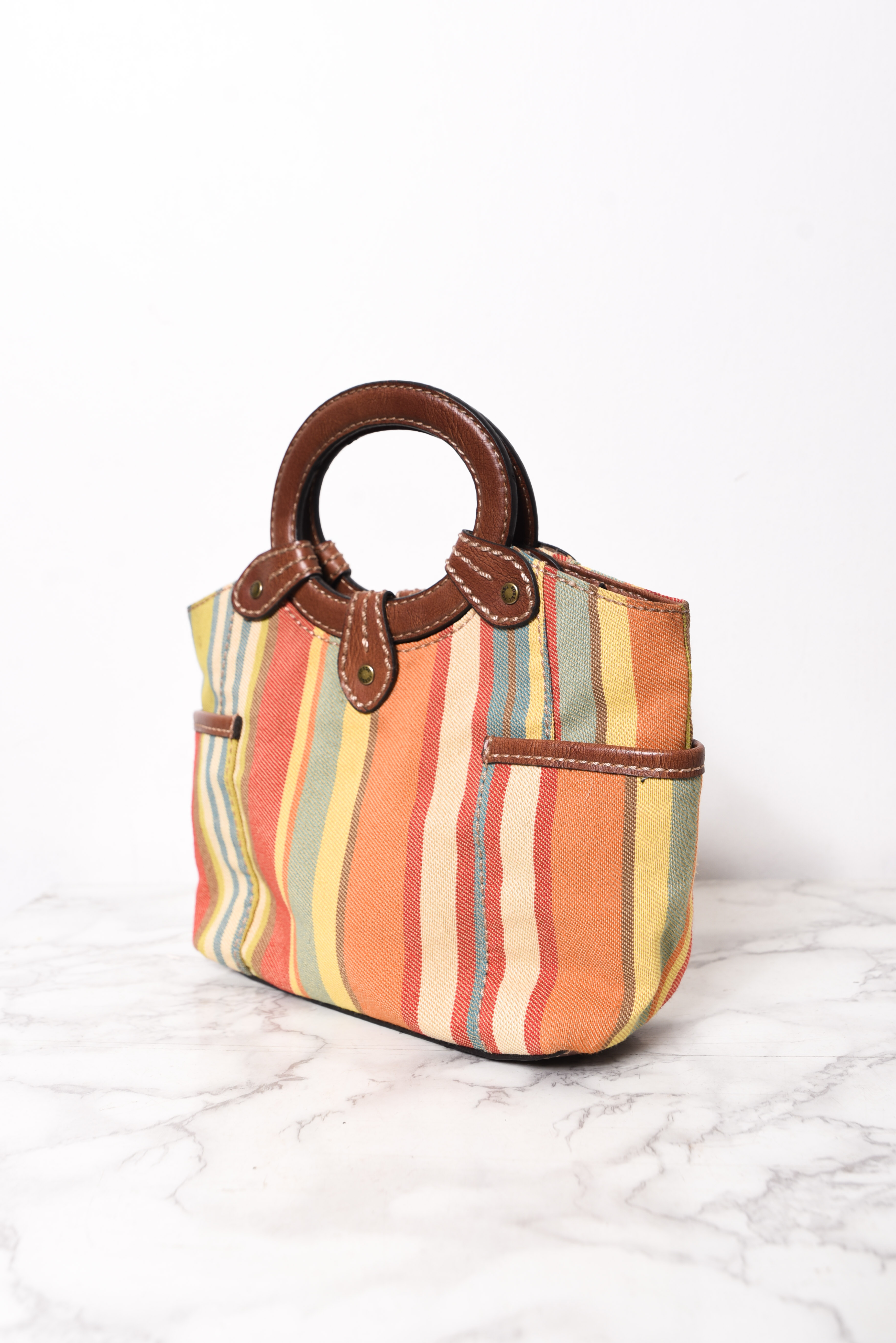 Cartera de mano rayada Fossil