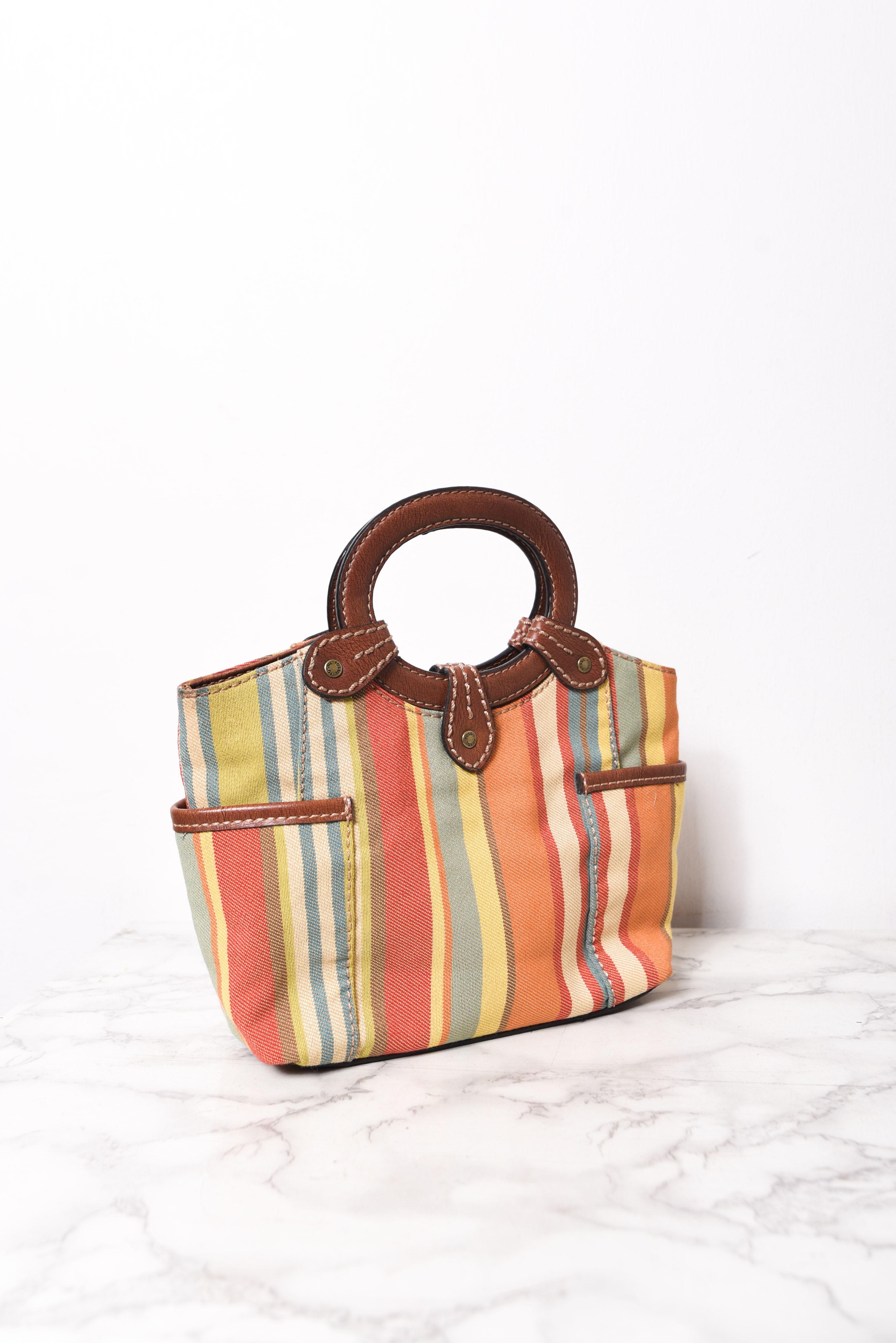 Cartera de mano rayada Fossil