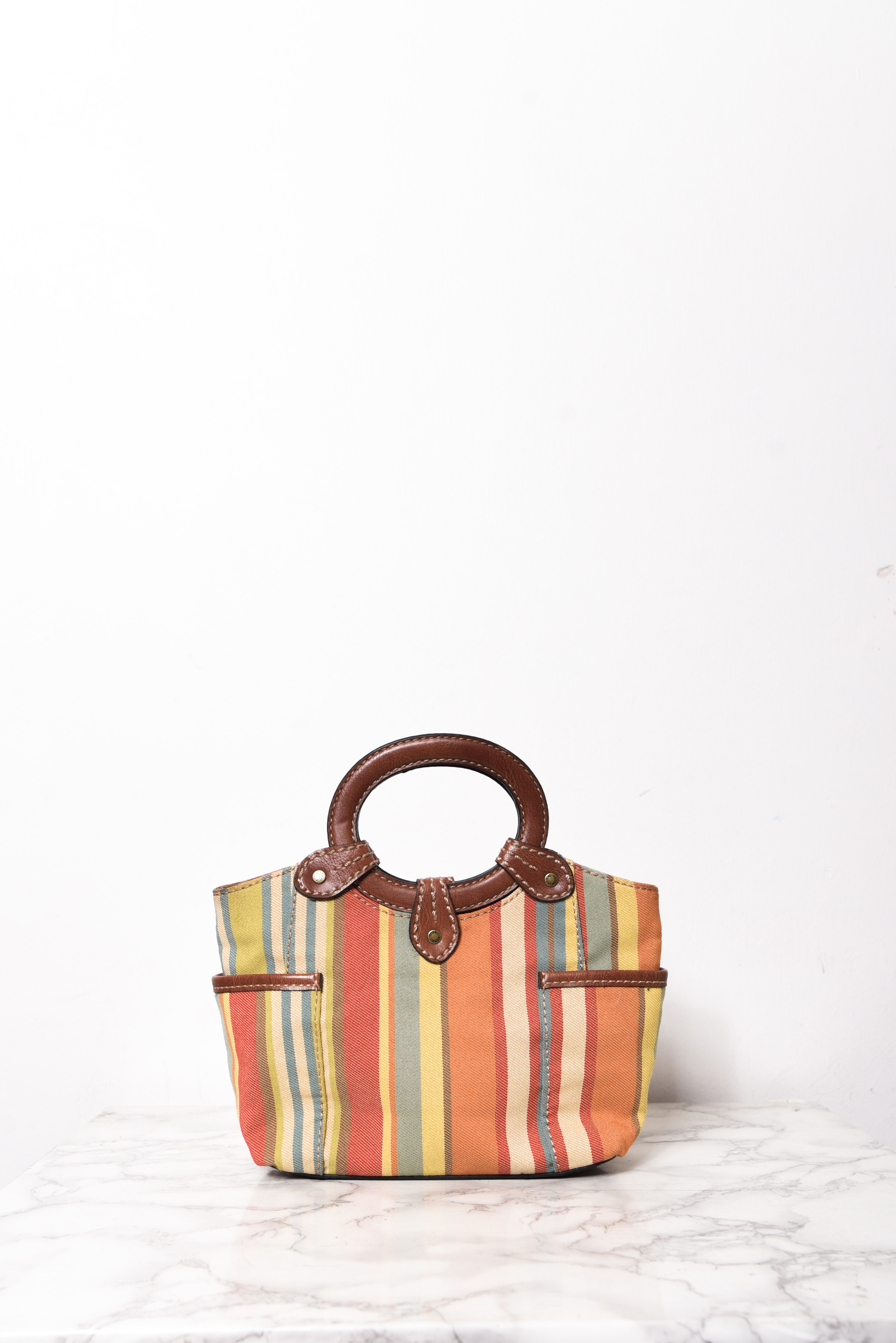 Cartera de mano rayada Fossil