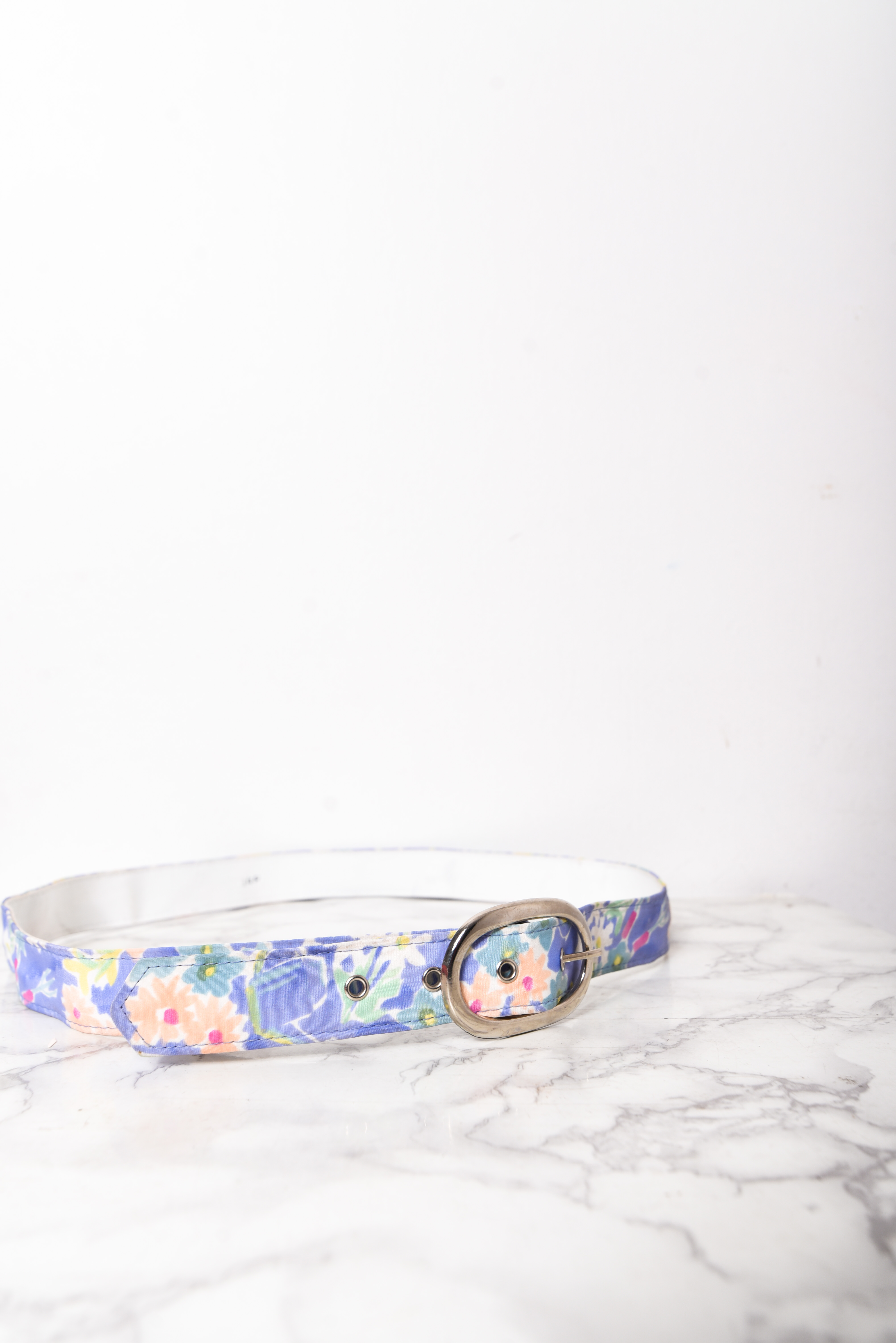 Cinturón floral pastel lila