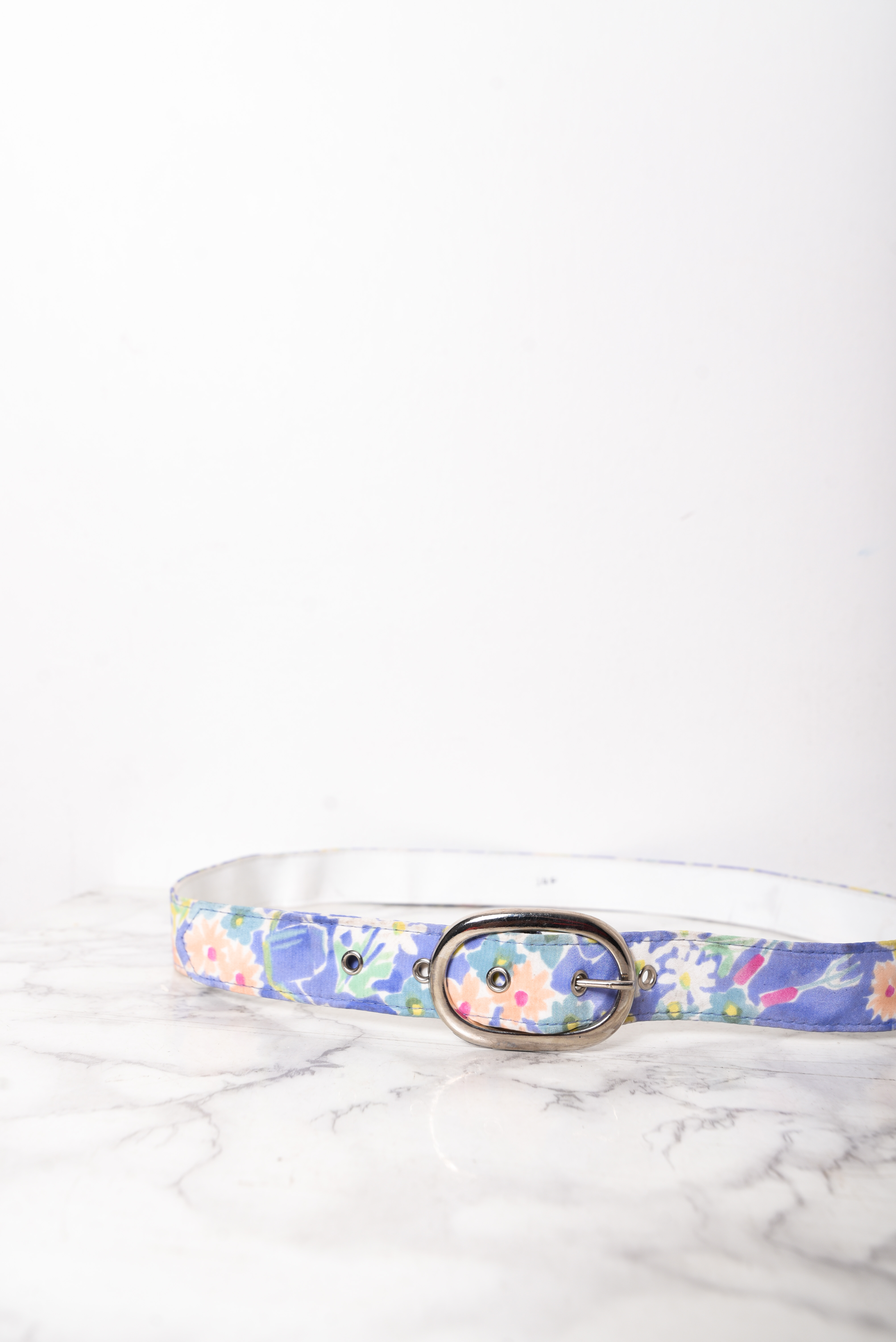 Cinturón floral pastel lila