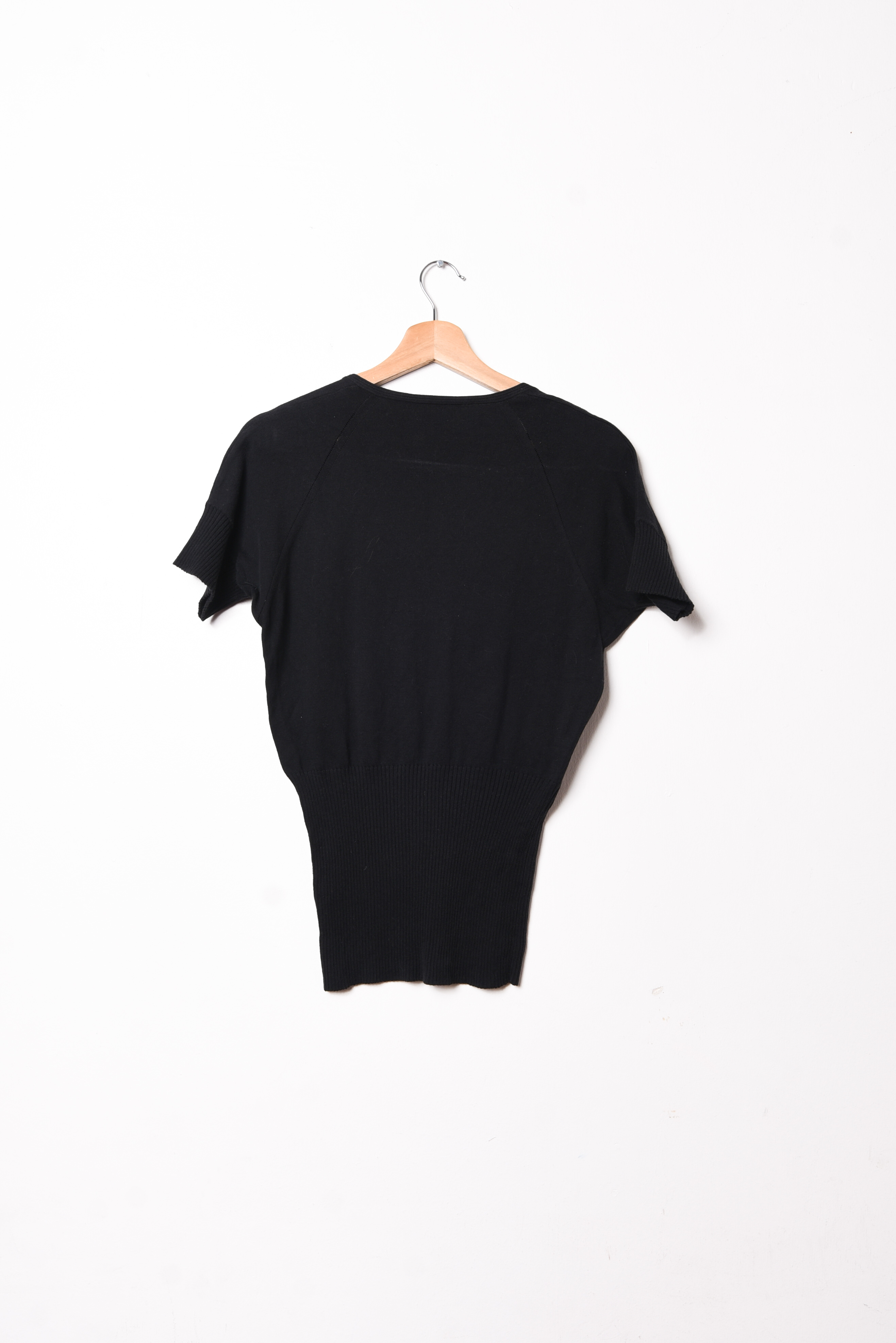 Top tejido negro manga murciélago