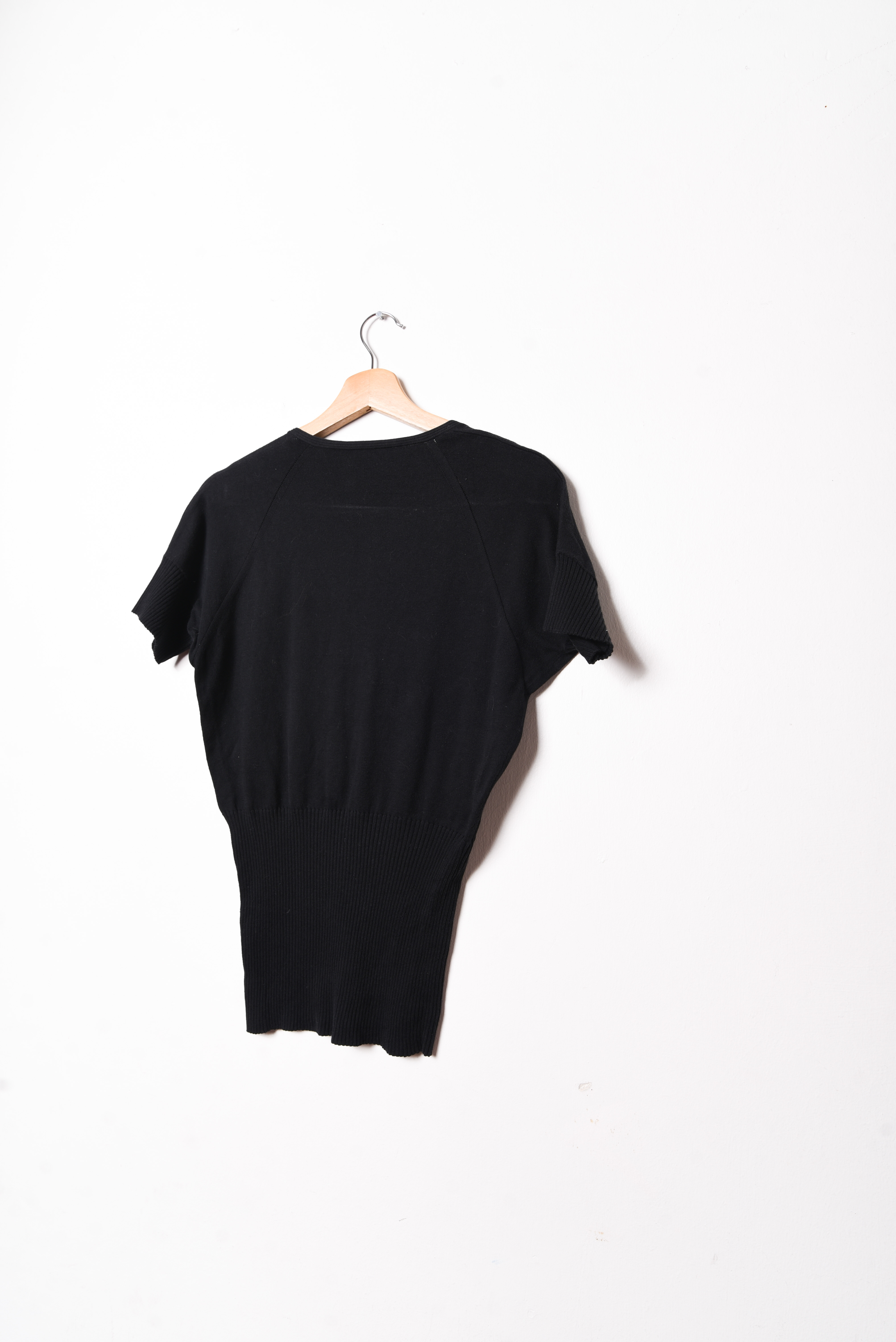 Top tejido negro manga murciélago