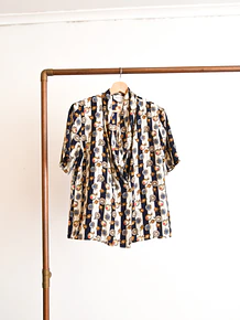 Blusa vintage print relojitos