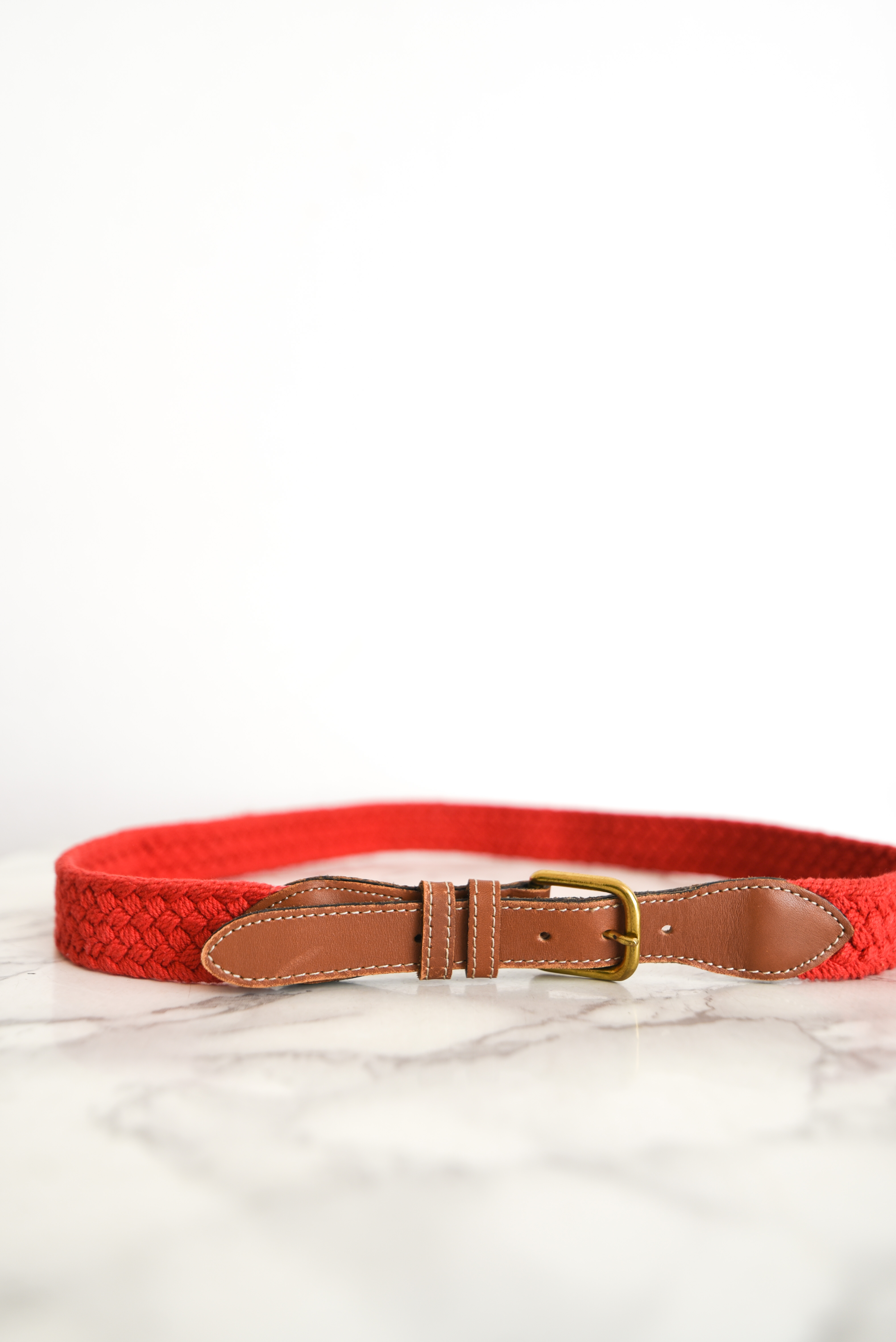 Cinturón rojo trenzado