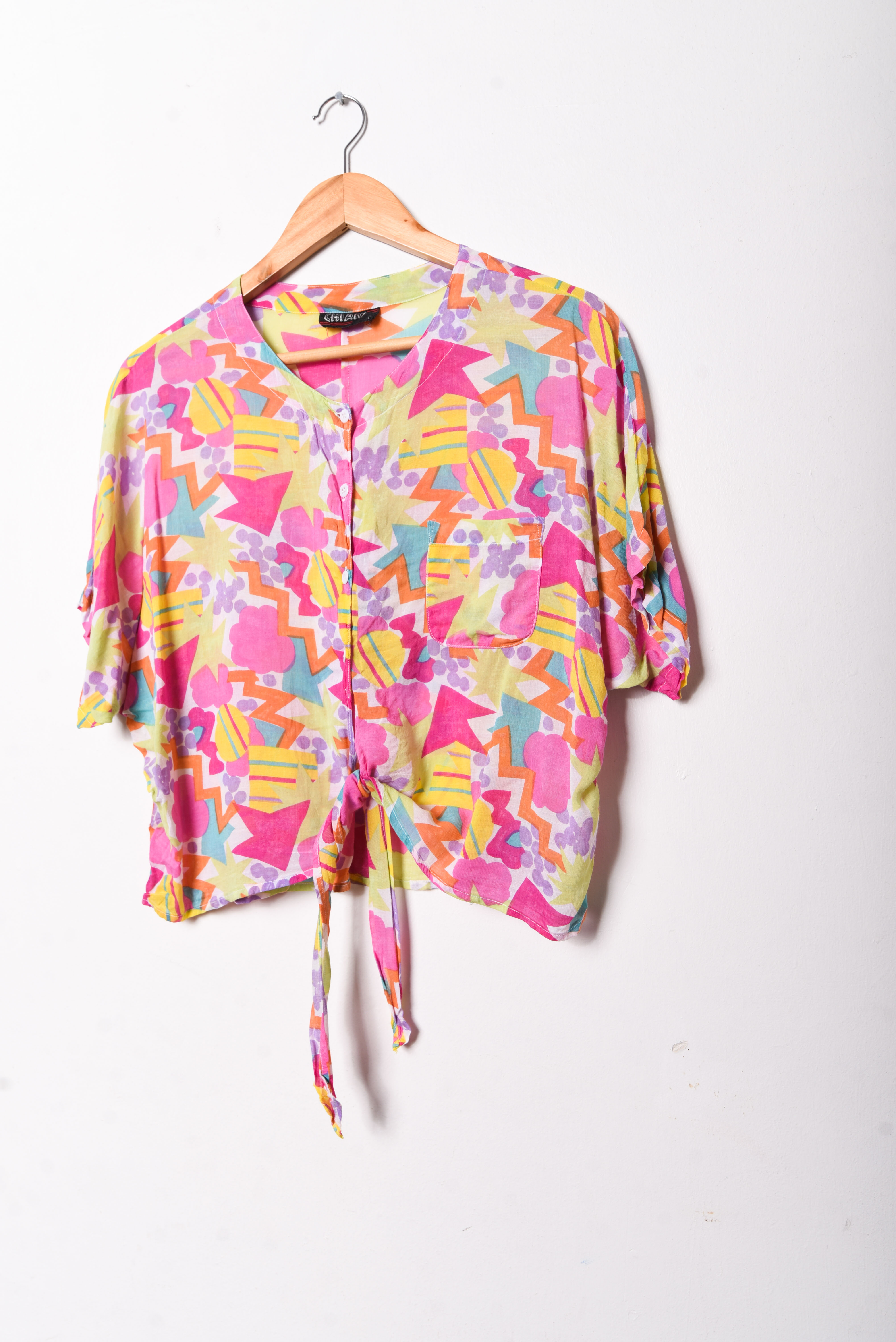 Blusa rosada nudo vintage