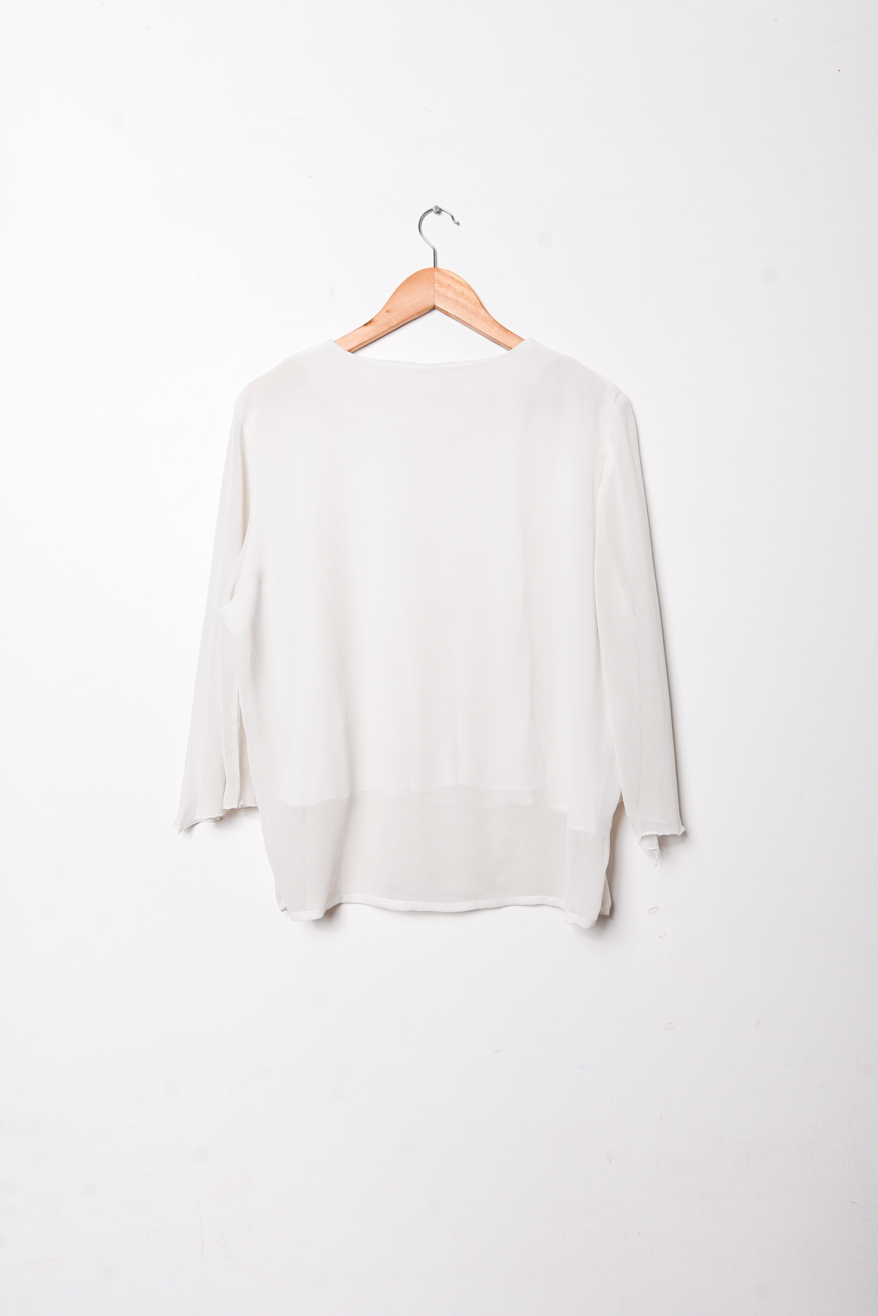 Blusa blanca bordada vaporosa