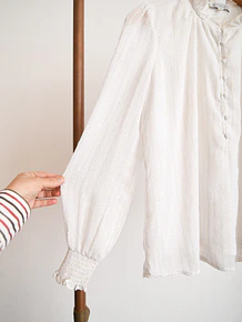 Blusa blanca vaporosa vuelos