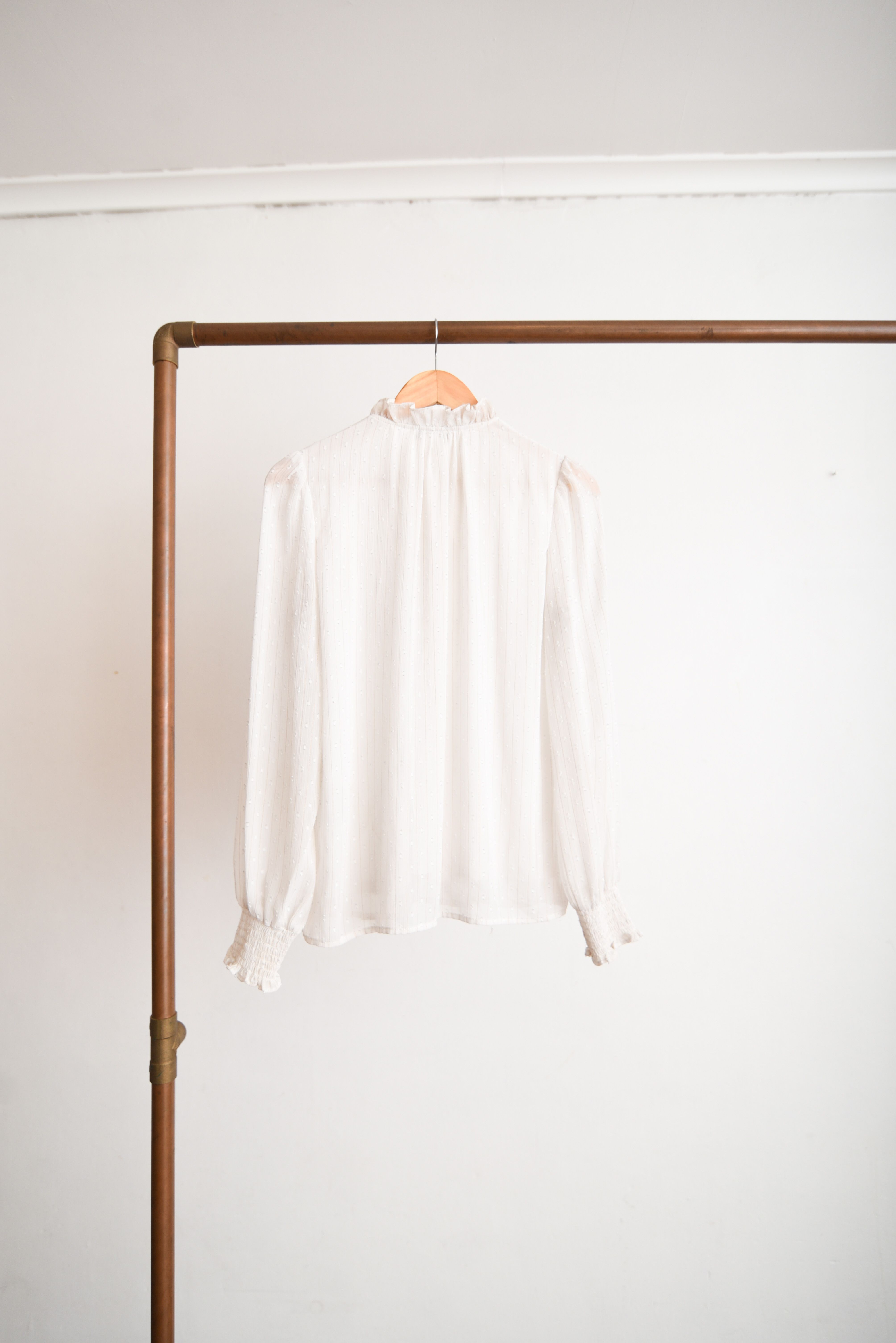Blusa blanca vaporosa vuelos