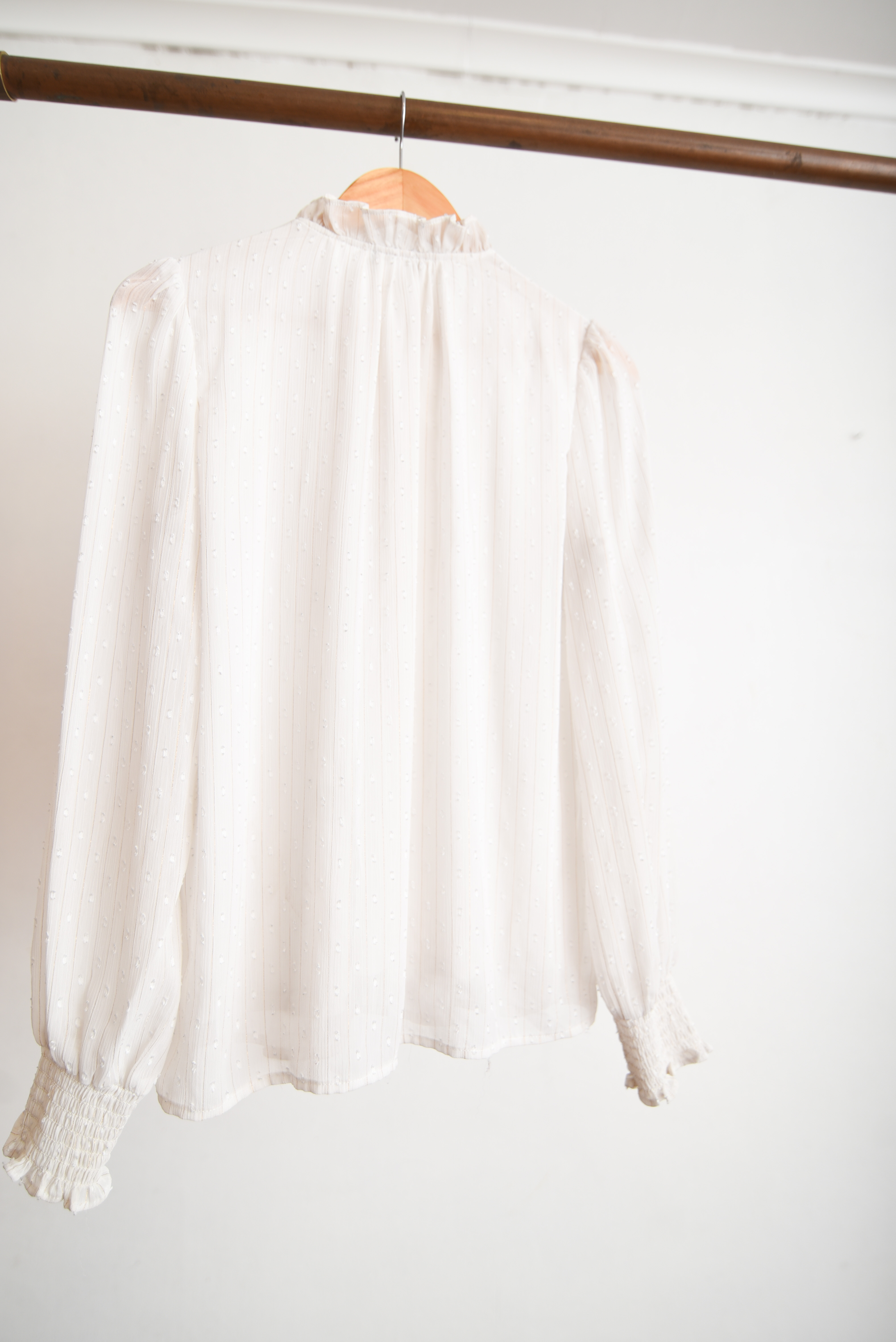Blusa blanca vaporosa vuelos