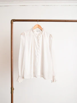 Blusa blanca vaporosa vuelos