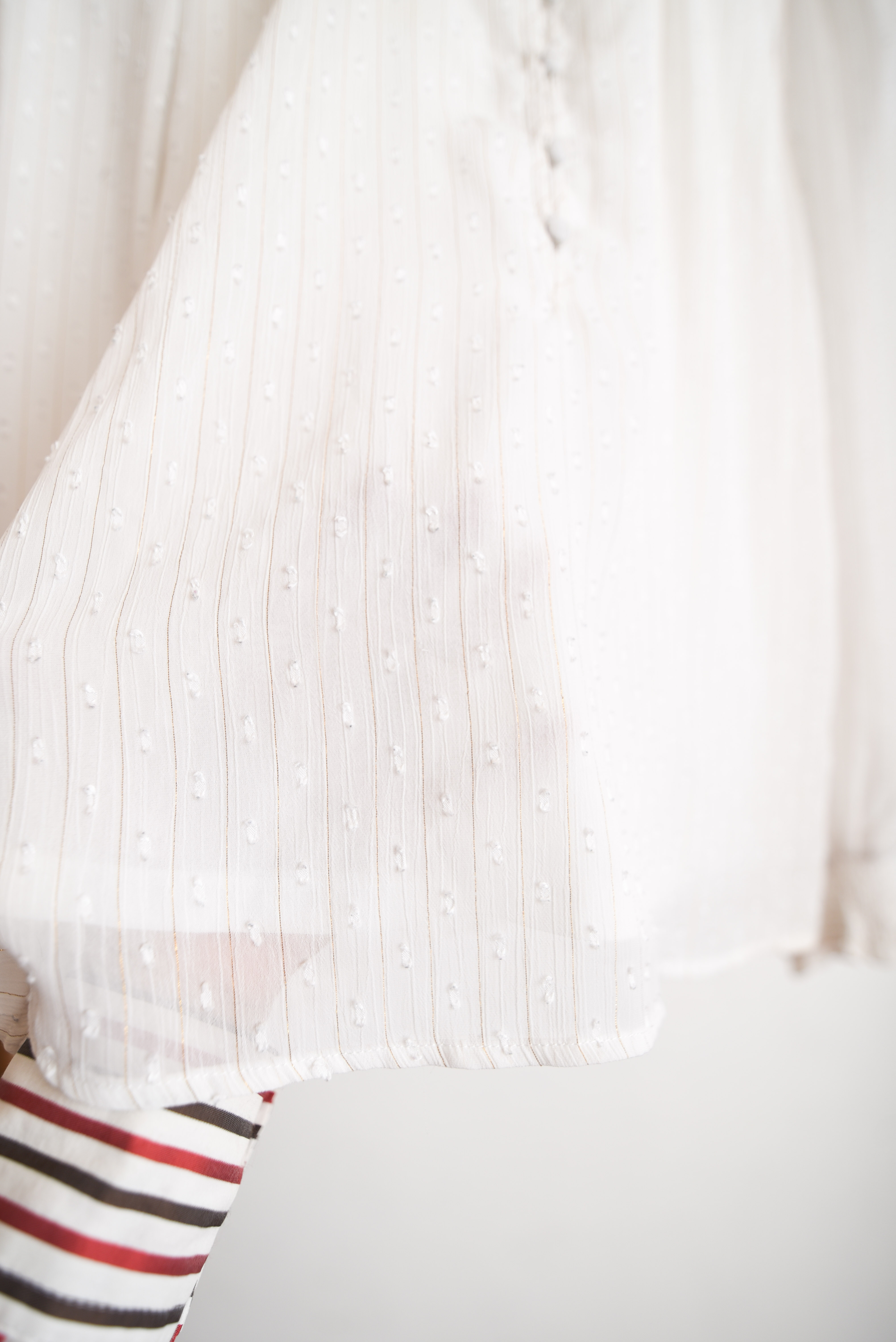 Blusa blanca vaporosa vuelos