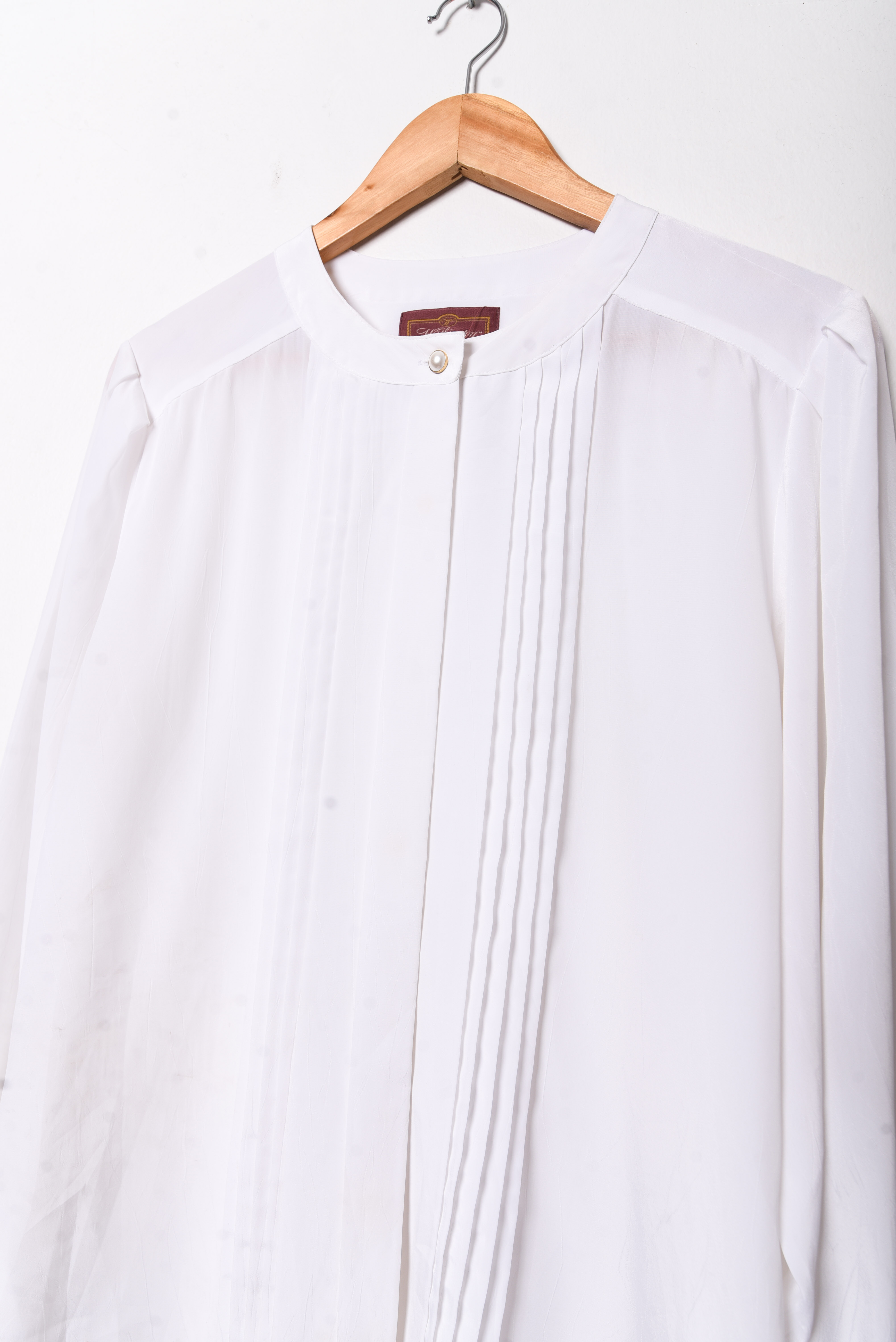 Blusa blanca plisada vintage