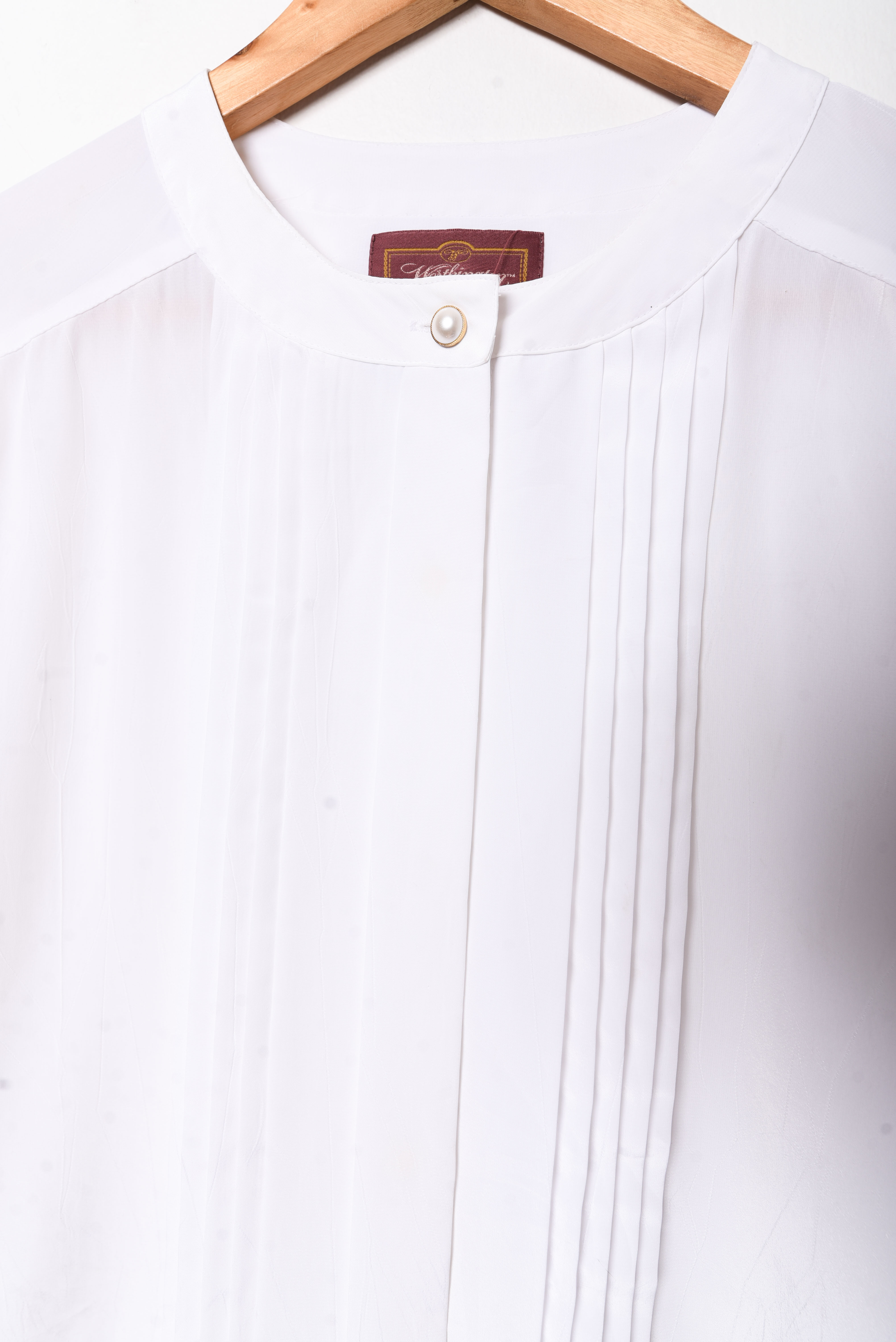Blusa blanca plisada vintage