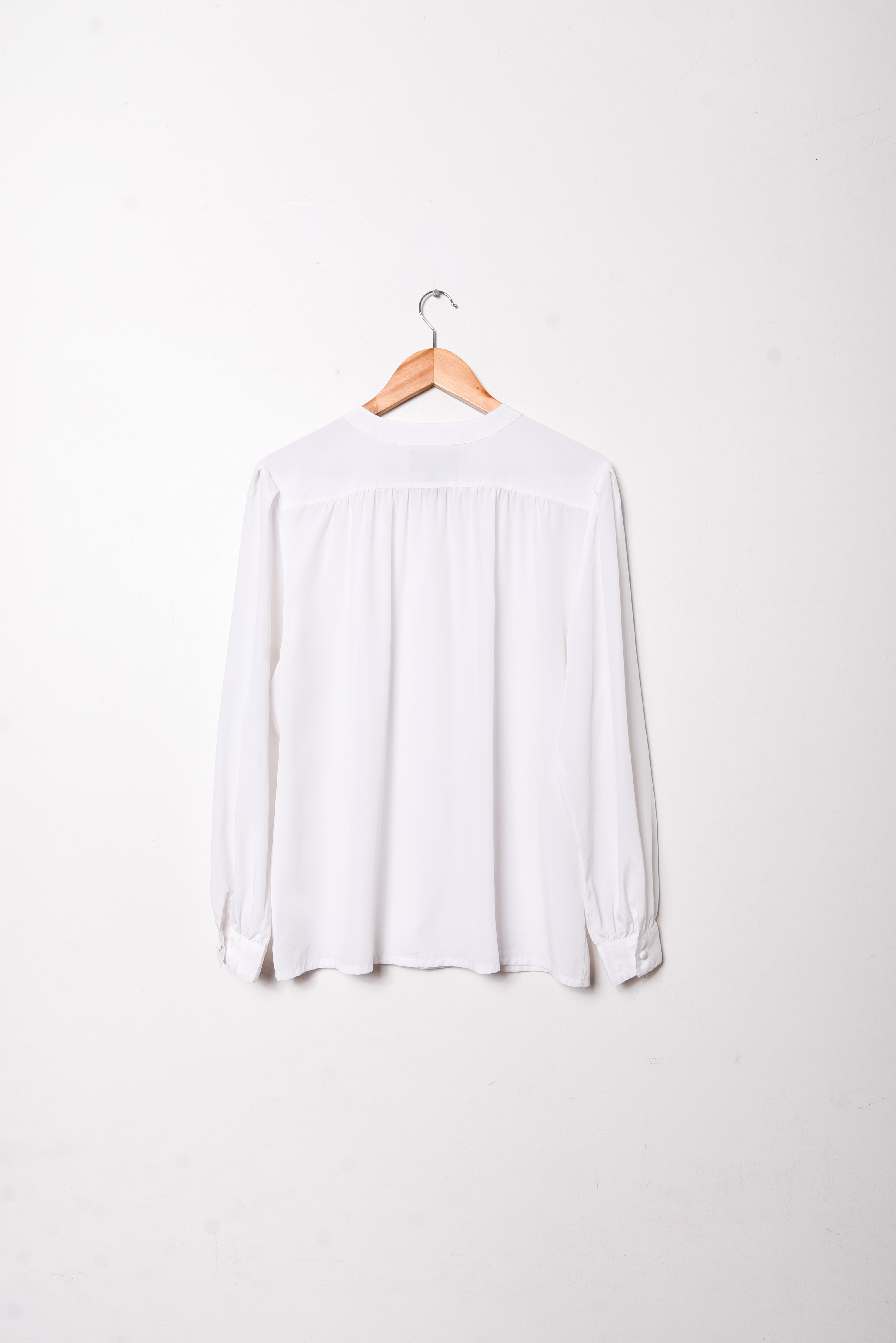 Blusa blanca plisada vintage