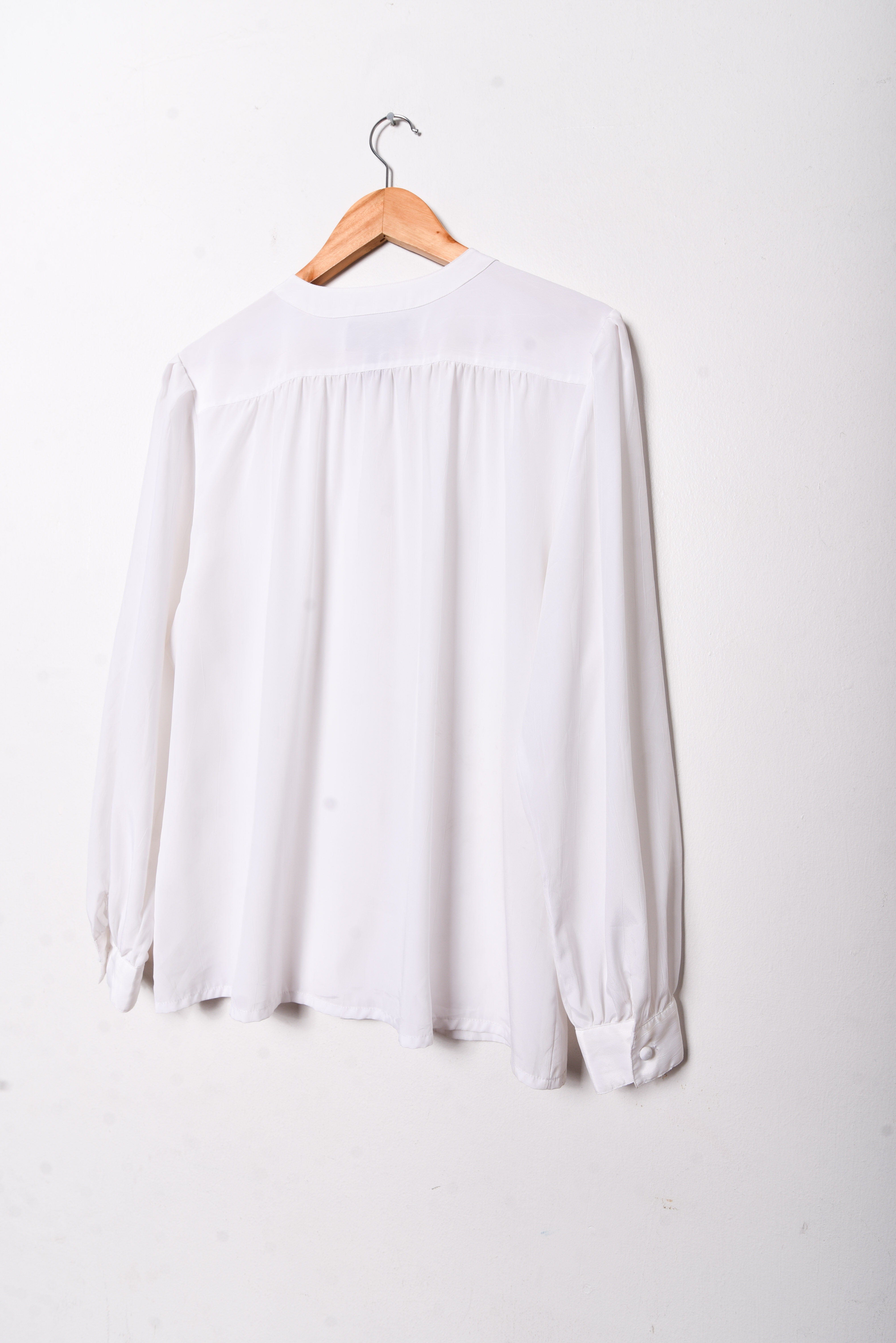 Blusa blanca plisada vintage