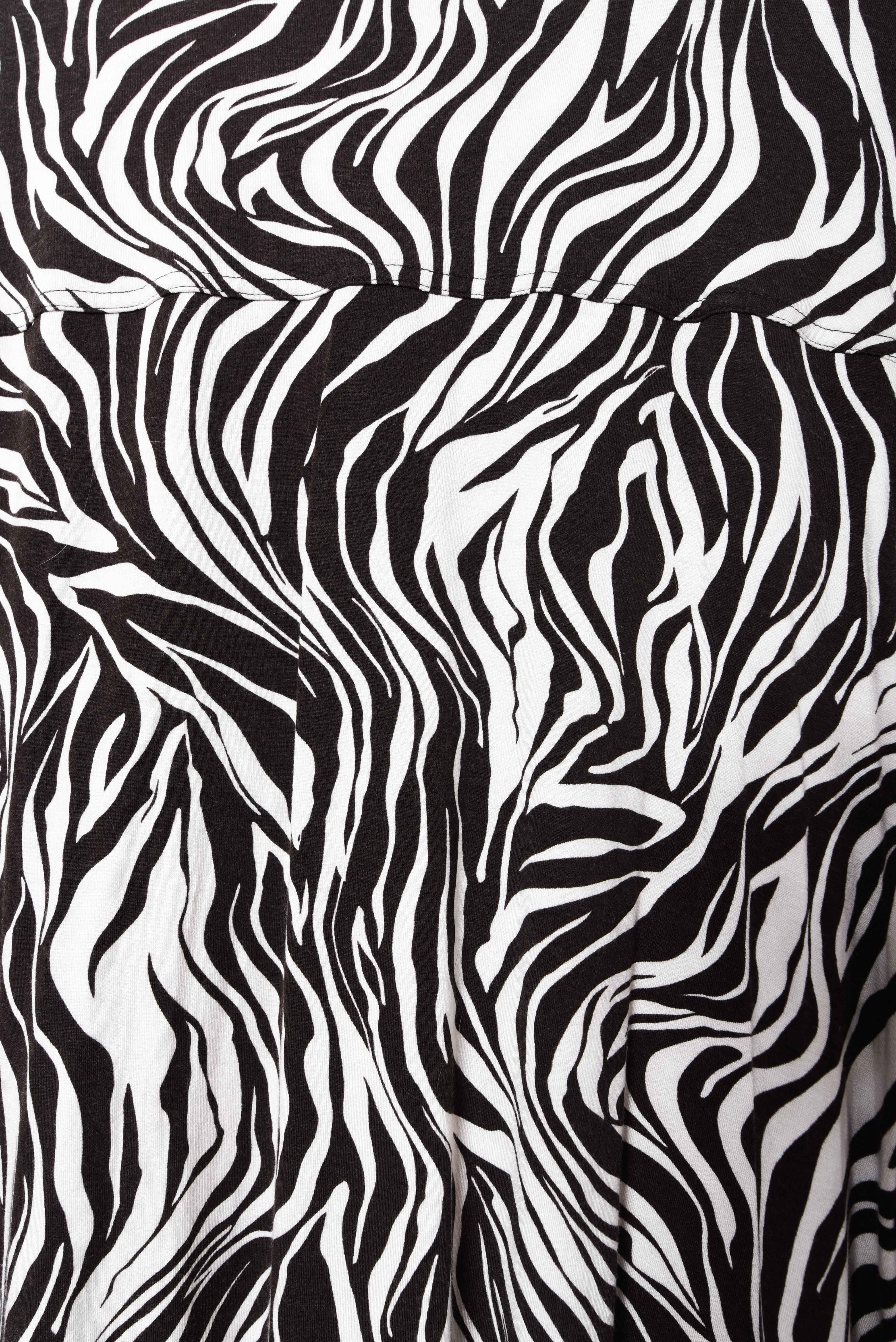 Blusón animal print café