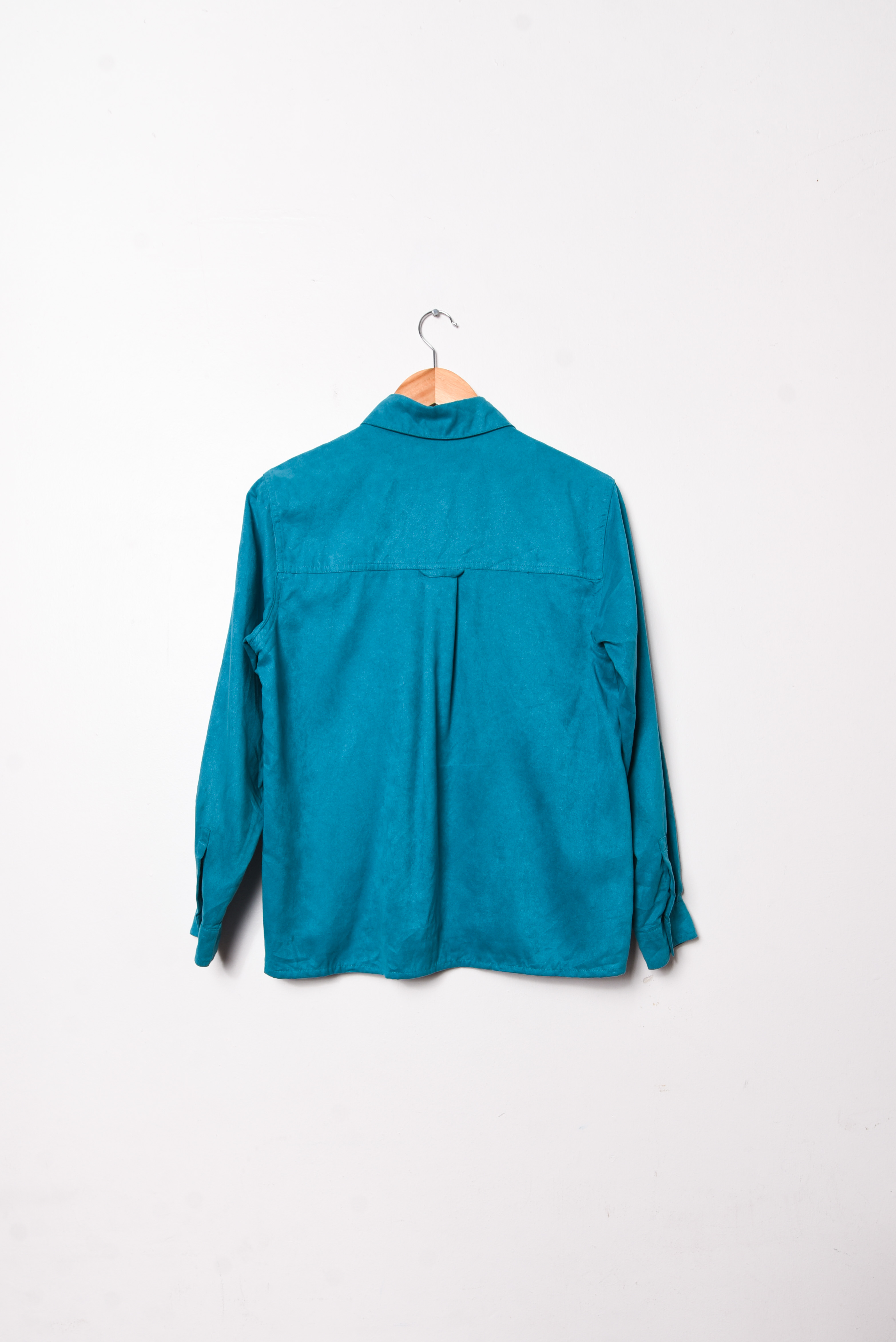 Camisa turquesa faux suede