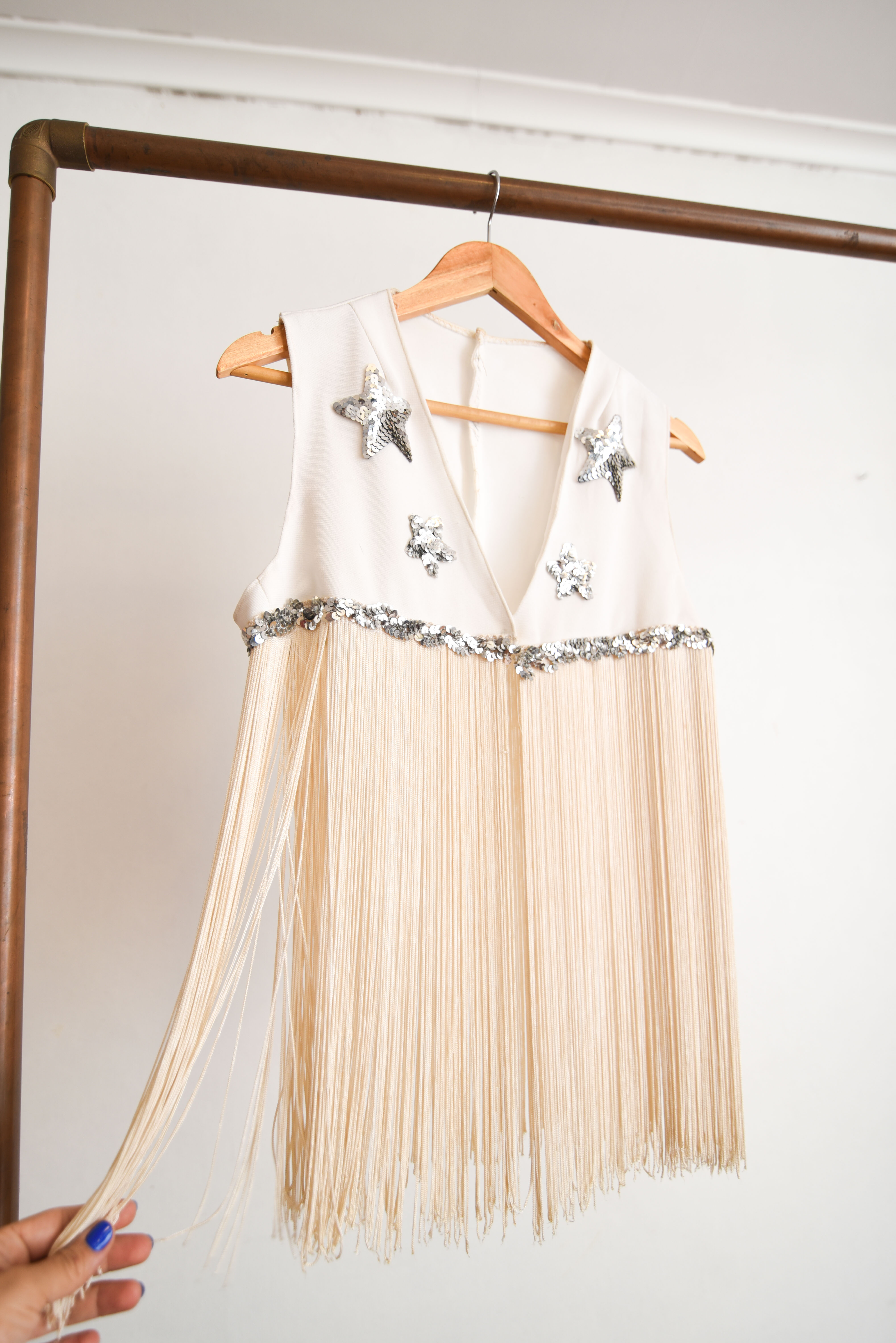 Vest estrellas y flecos 70s