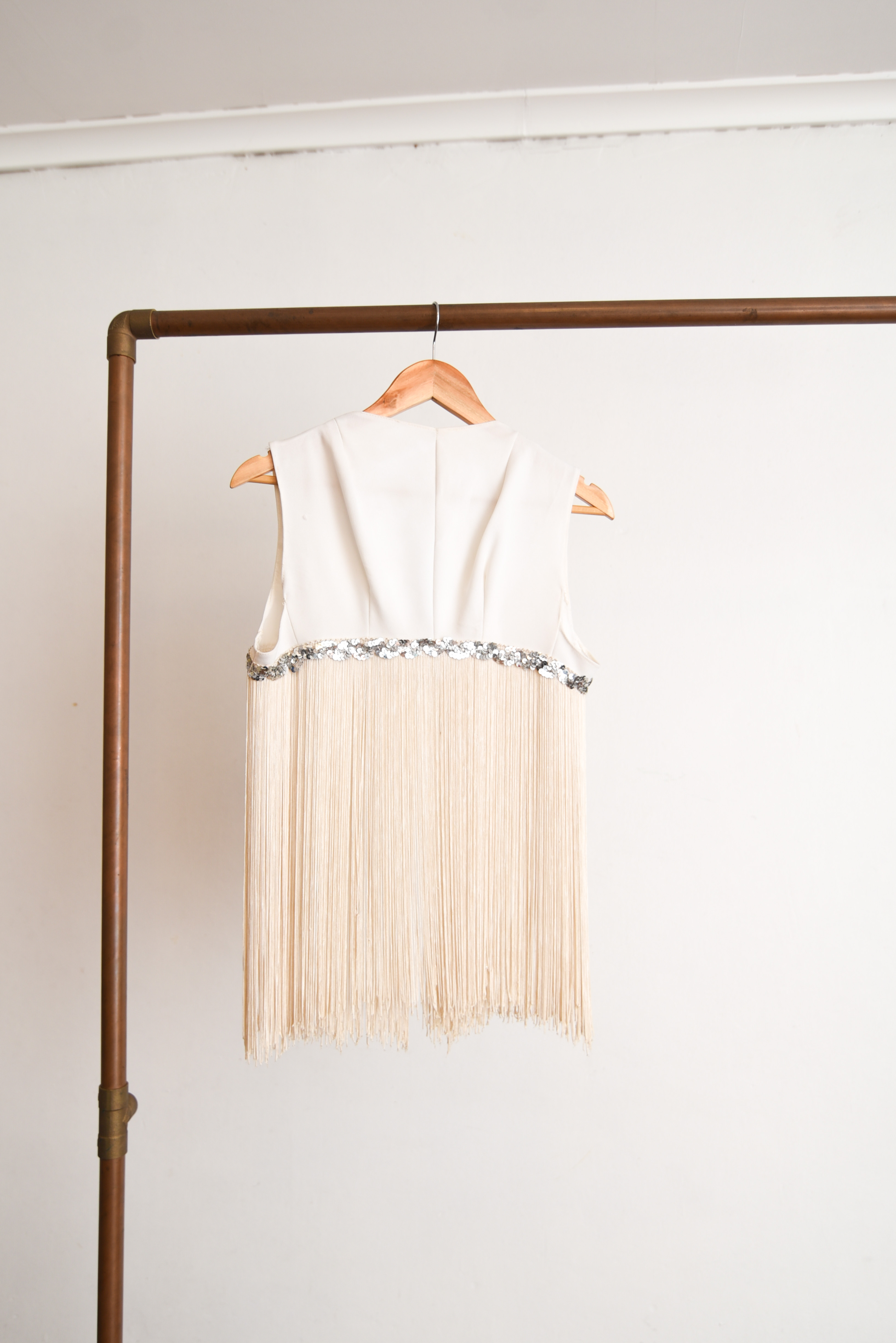 Vest estrellas y flecos 70s