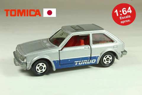 Tomica No. 4 Mazda Familia 1500XG (Gris) Japan