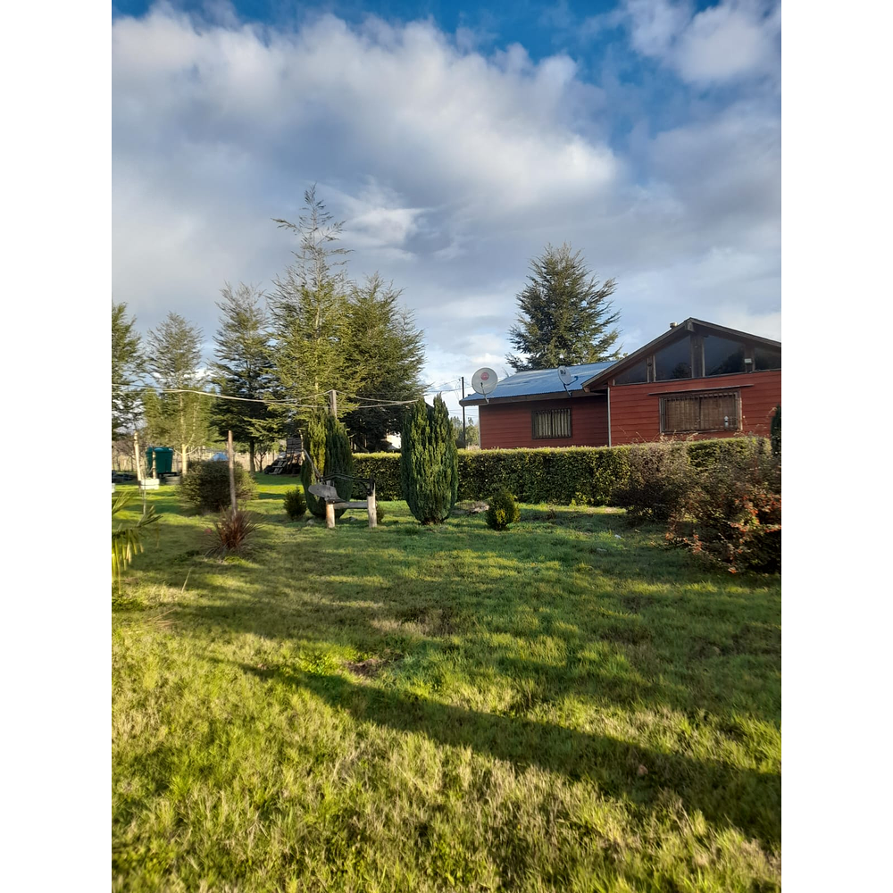 PARCELA CON CASA Y CABAÑA A ORILLA CARRETERA RUTA FREIRE A VILLARRICA SECTOR PUQUEREO