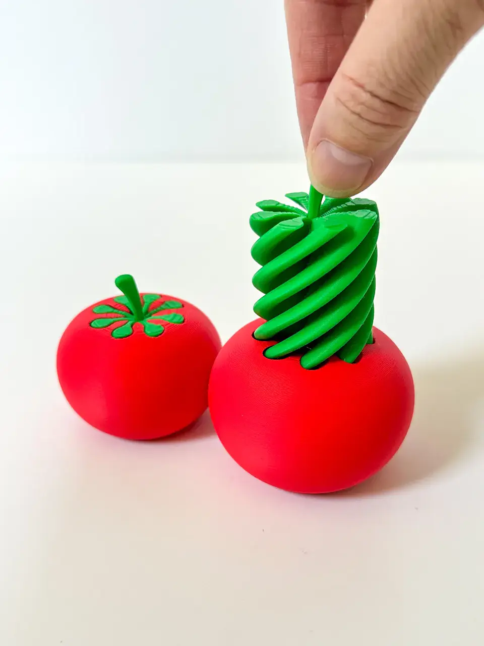 Tomate fidget sensorial – Objeto Anti-Estrés Retráctil / Espiral 1
