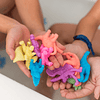 Squishy Juguetes de dinosaurios que crecen en agua para niño