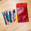 Estuche rojo para lápices