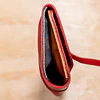 Estuche rojo roll-up para lápices bolsillos de colores