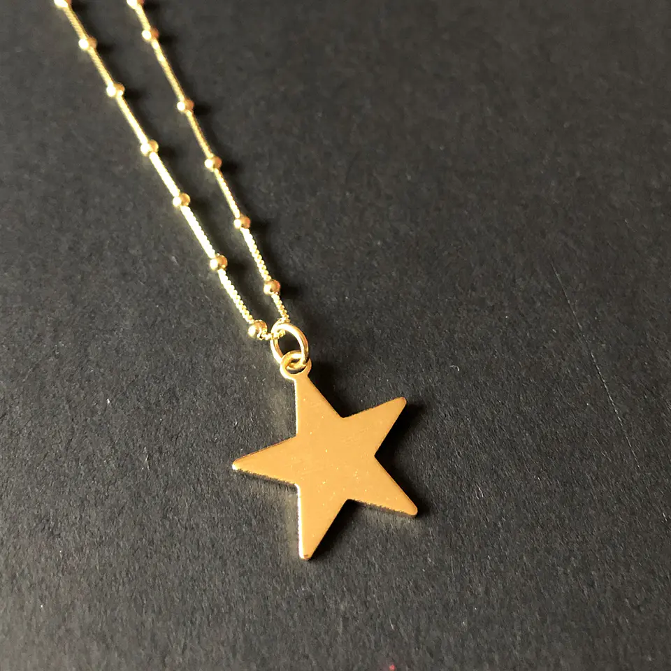 COLGANTE ESTRELLA | BAÑO ORO 1
