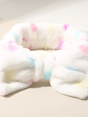Faixa de cabelo macia de pelúcia com laço
