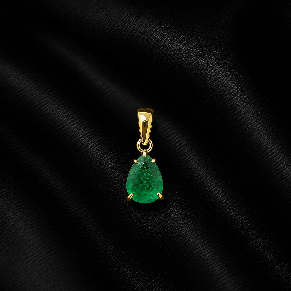 Dije en oro con esmeralda 1