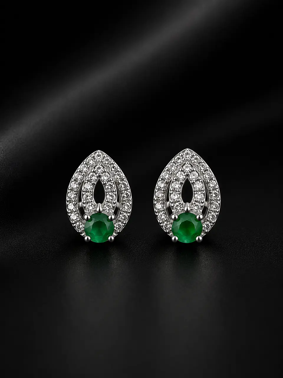 Aretes en plata con esmeralda 1