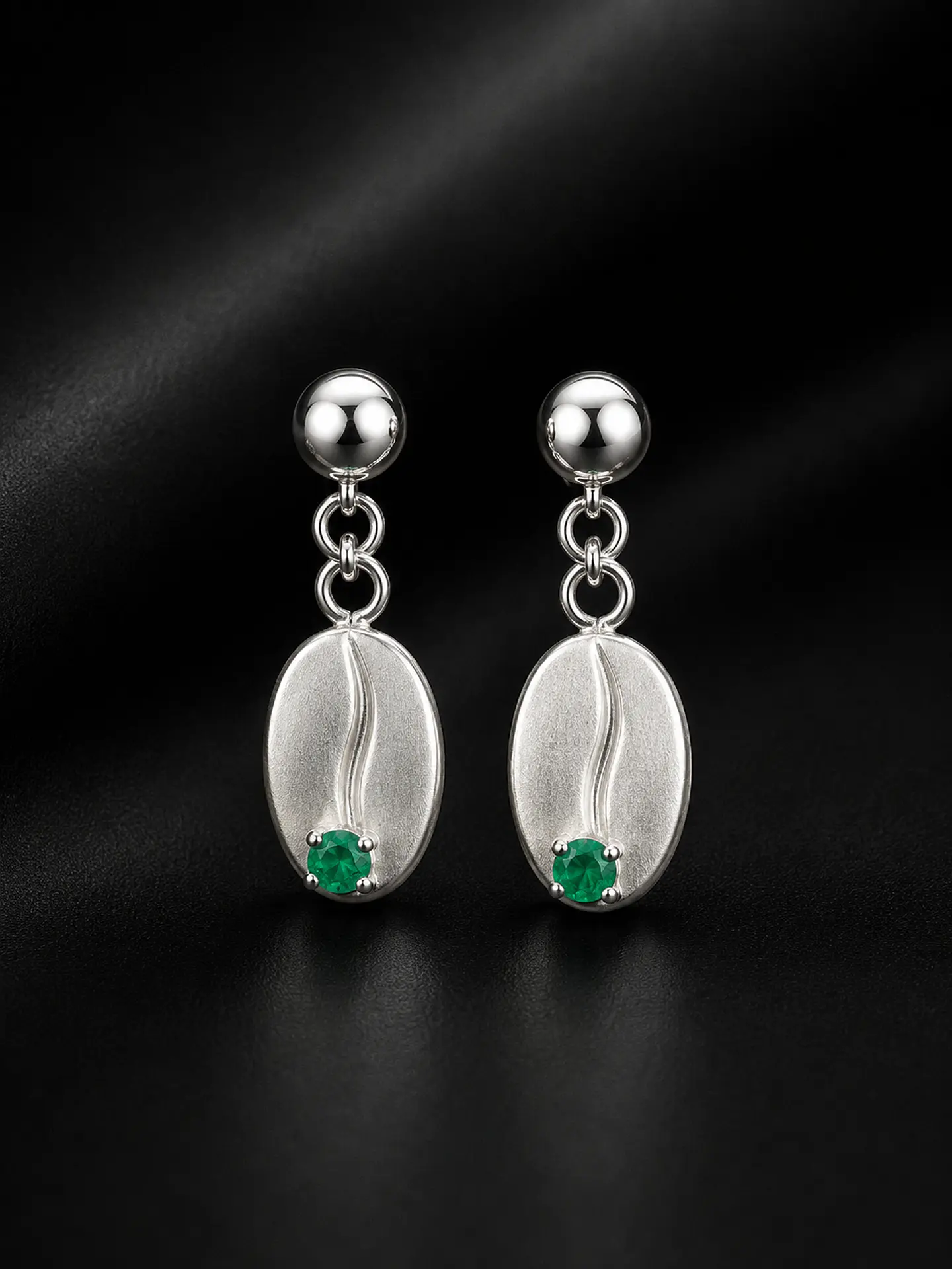 Aretes en plata con esmeralda 1