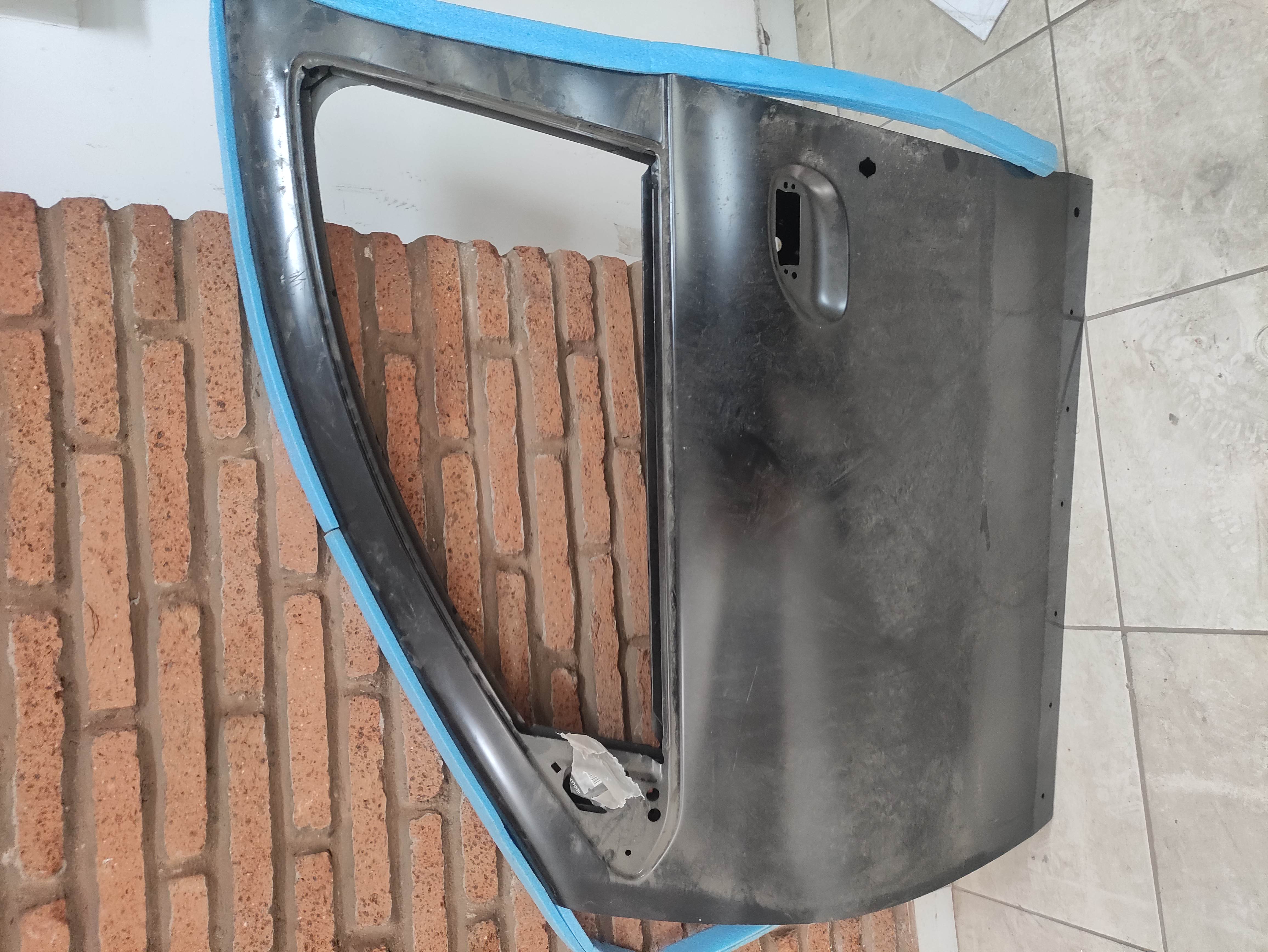 PUERTA RENAULT CLIO / SYMBOL/ LOGAN 1