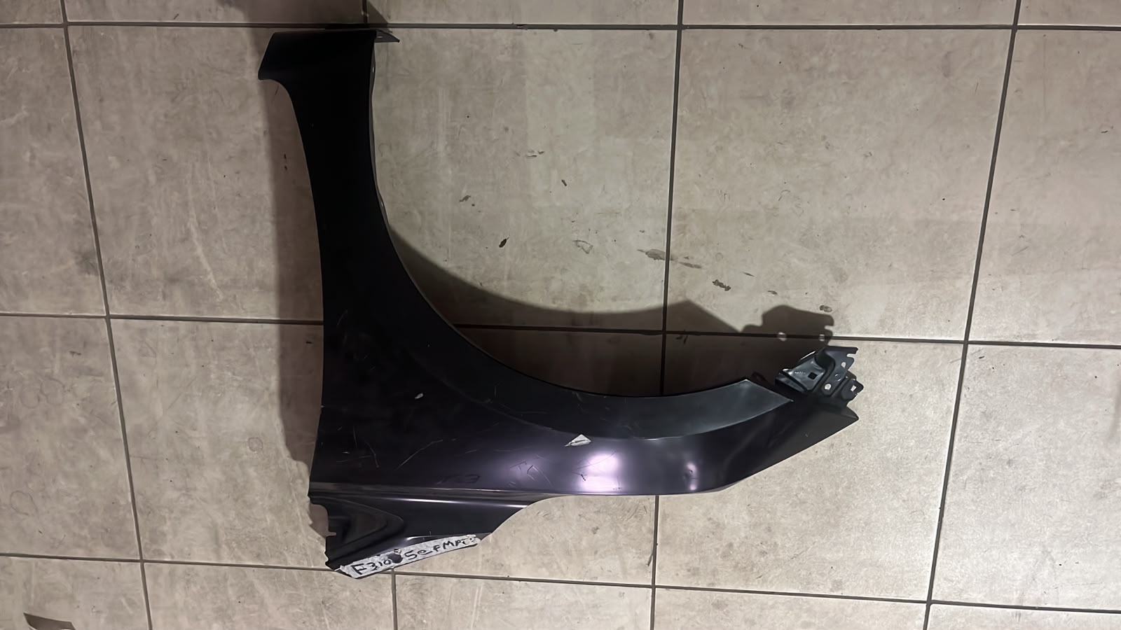 TAPA NISSAN VERSA 1
