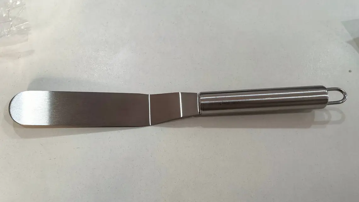 Espátula acodada para repostería con mango metálico (x12) 1