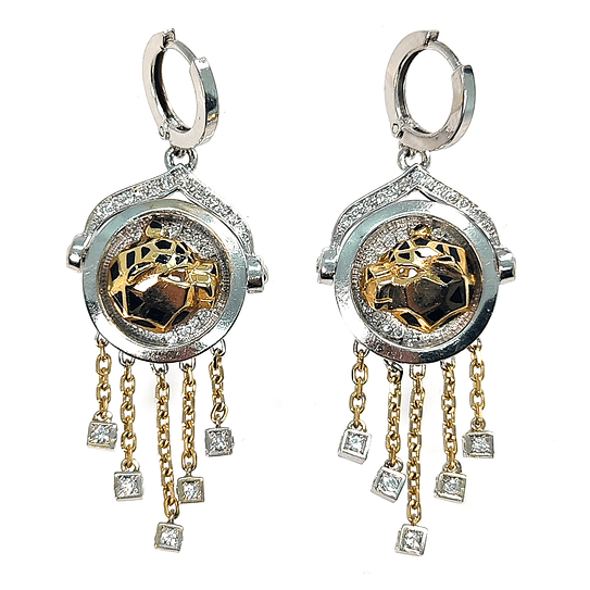 Aros de oro blanco y amarillo 18k con figura de Leopardos, brillante de 140 puntos peso 19,85 grs 1