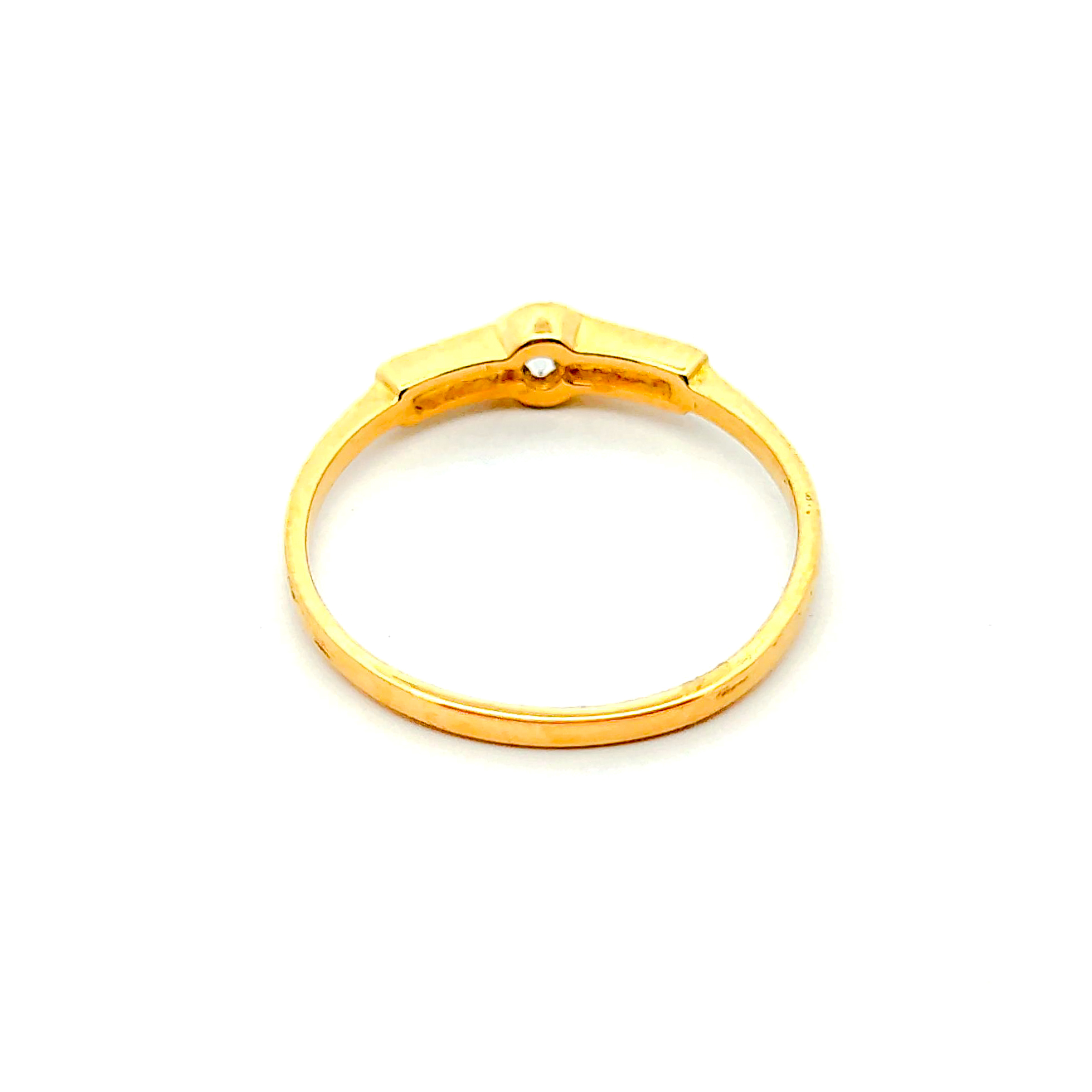 Anillo de oro 18k solitario con piedra central incolora, peso 1,49 grs, Talla 13 3