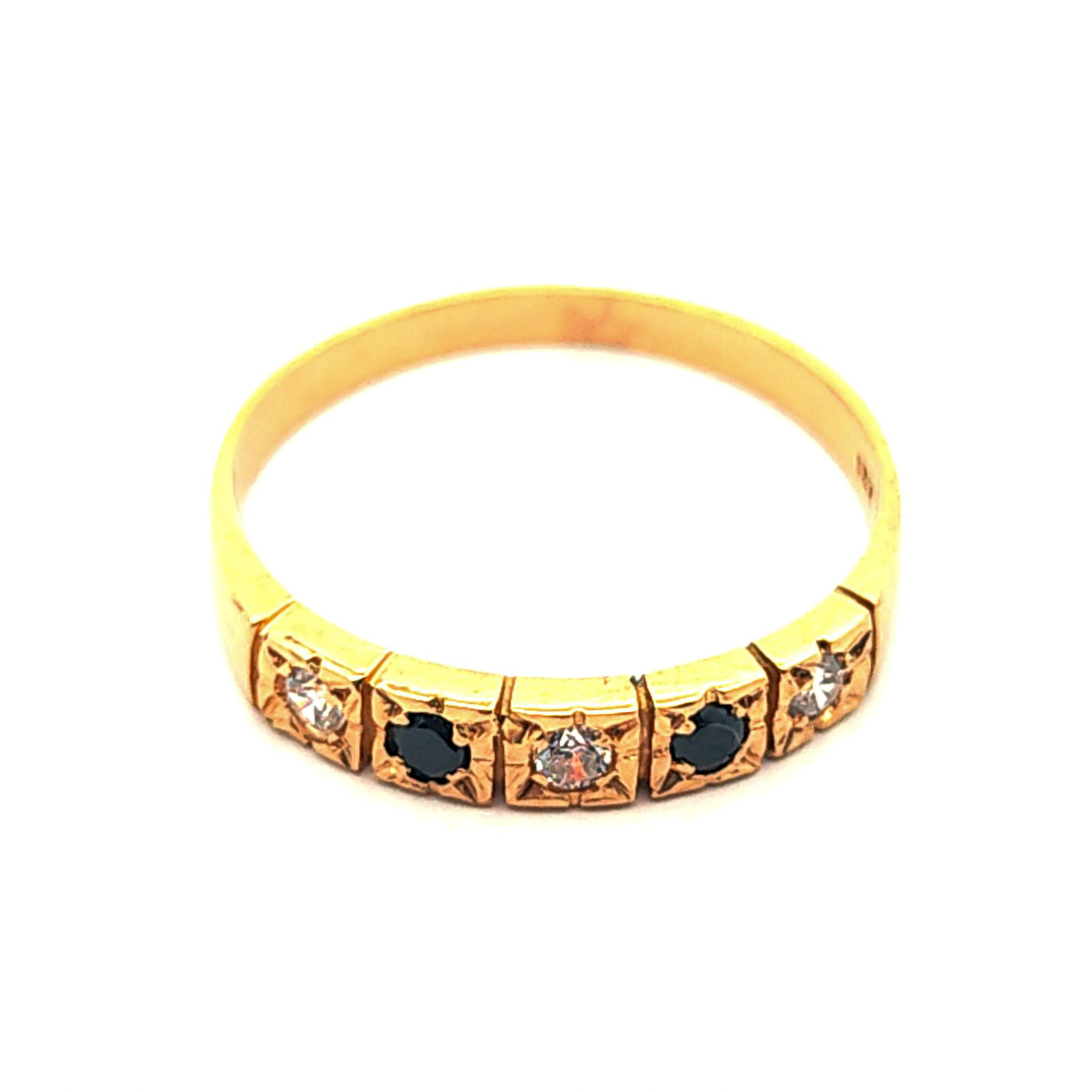 Anillo de oro 18k con circones, peso 1,95 grs, talla 15 3