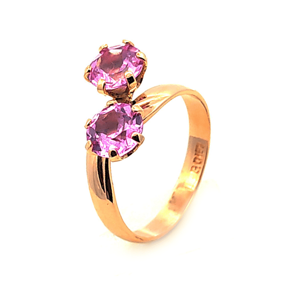 Anillo de oro 18k diseño cruzado con 2 circones rosa, peso 3,46 grs, talla 14