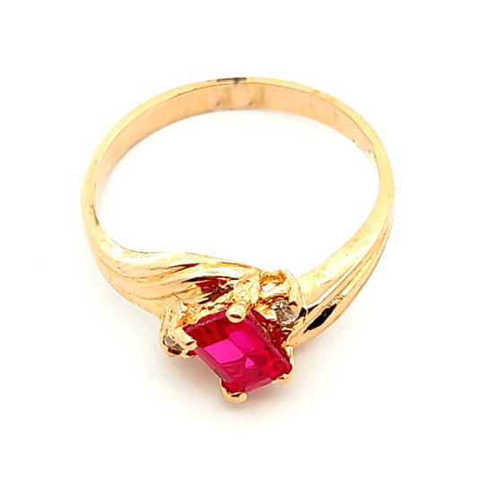 Anillo de oro 18k modelo solitario con piedra central roja, peso 3,00 grs talla 14 3