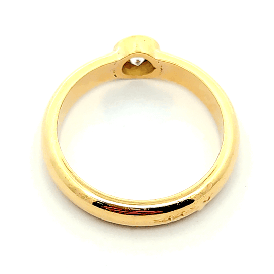 Anillo de oro 18k solitario con circon central, peso 4,83 grs talla 12 4